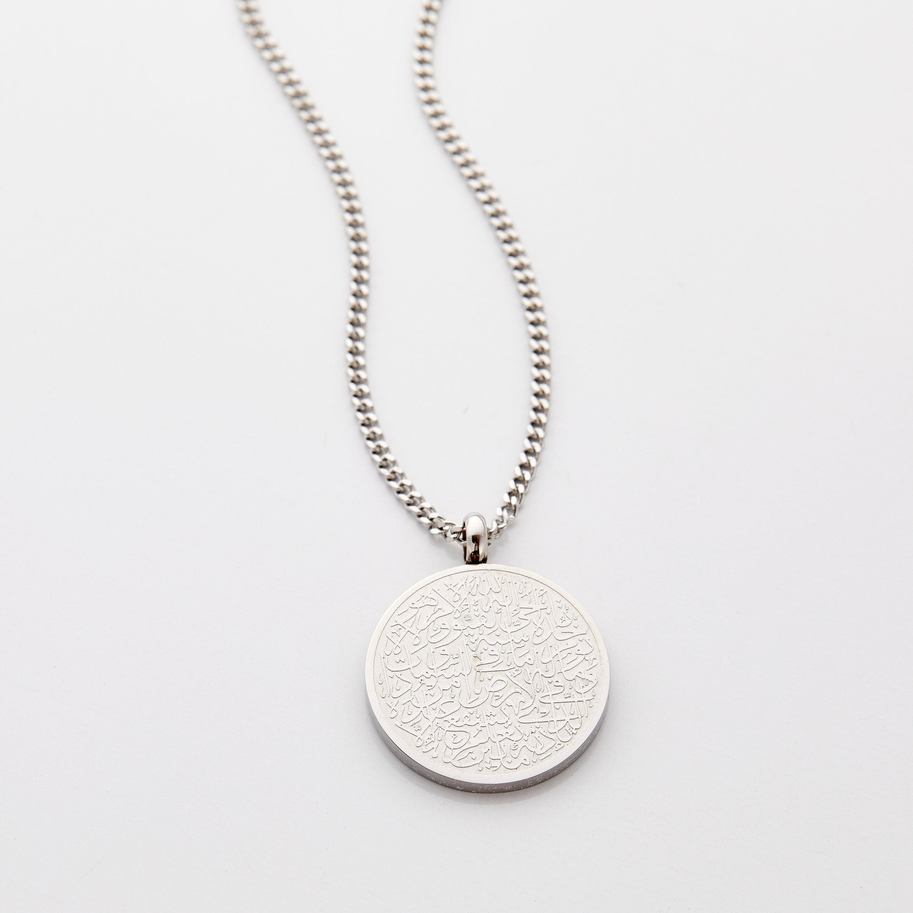 Children wearing the Ayatul Kursi necklace, demonstrating its beauty and significance.