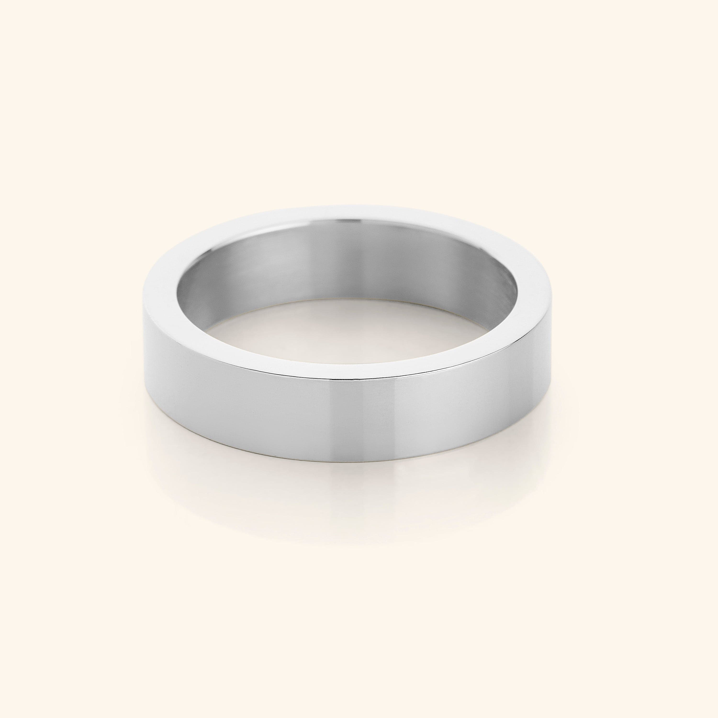 Close-up view of the Bold Essentials Statement Ring showcasing its gold-dipped finish and sleek design.