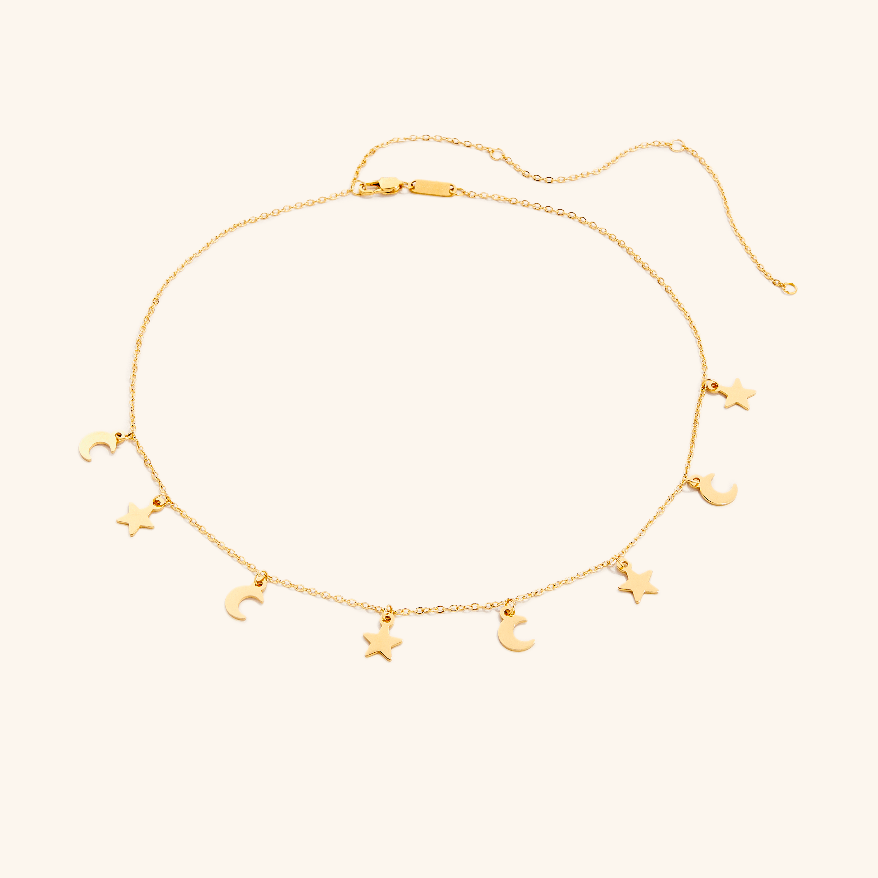 Celestial Charm Layered Choker Necklace showcased on a model, featuring moon and star charms.