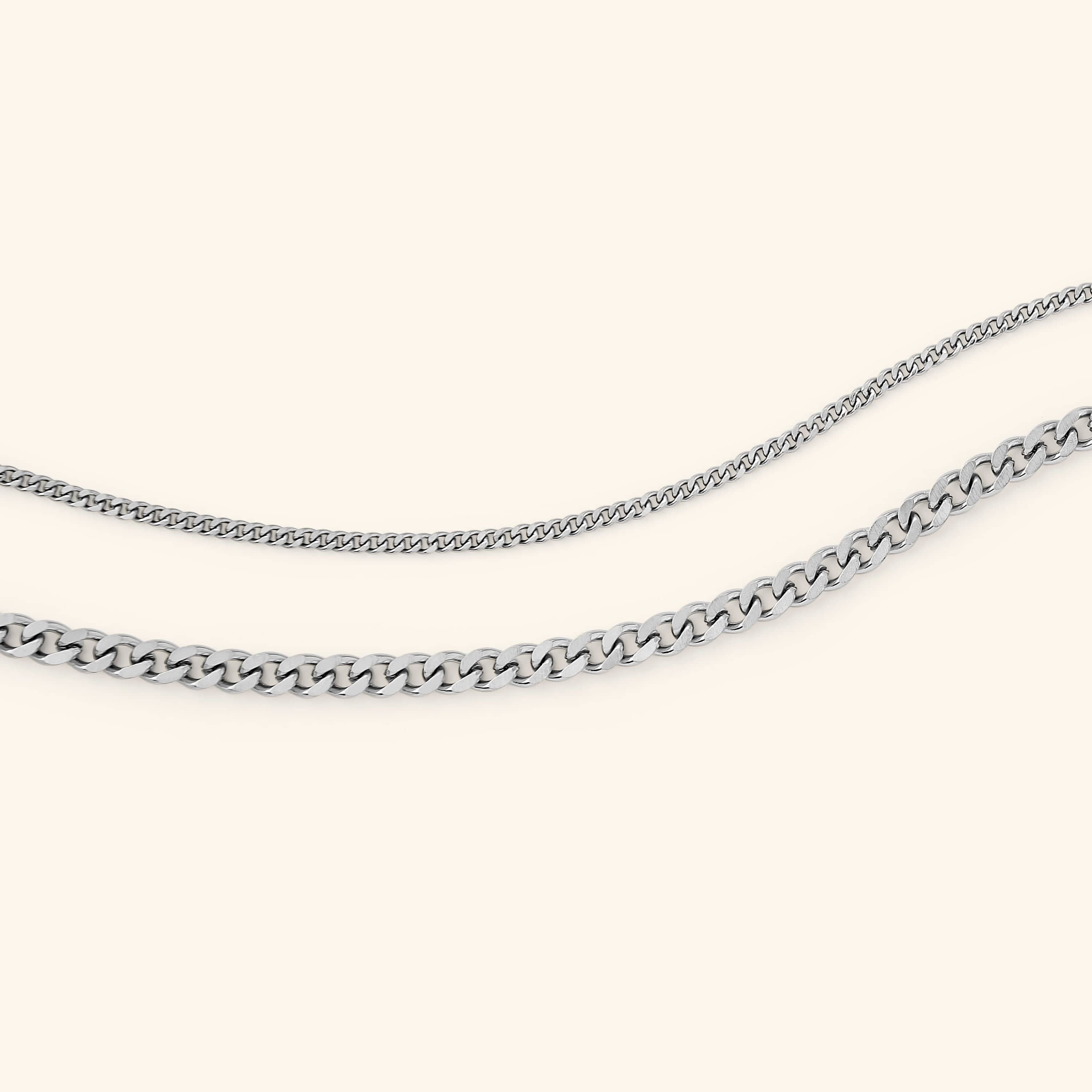 Elegant curb chain anklet showcasing flat links and gold finish.