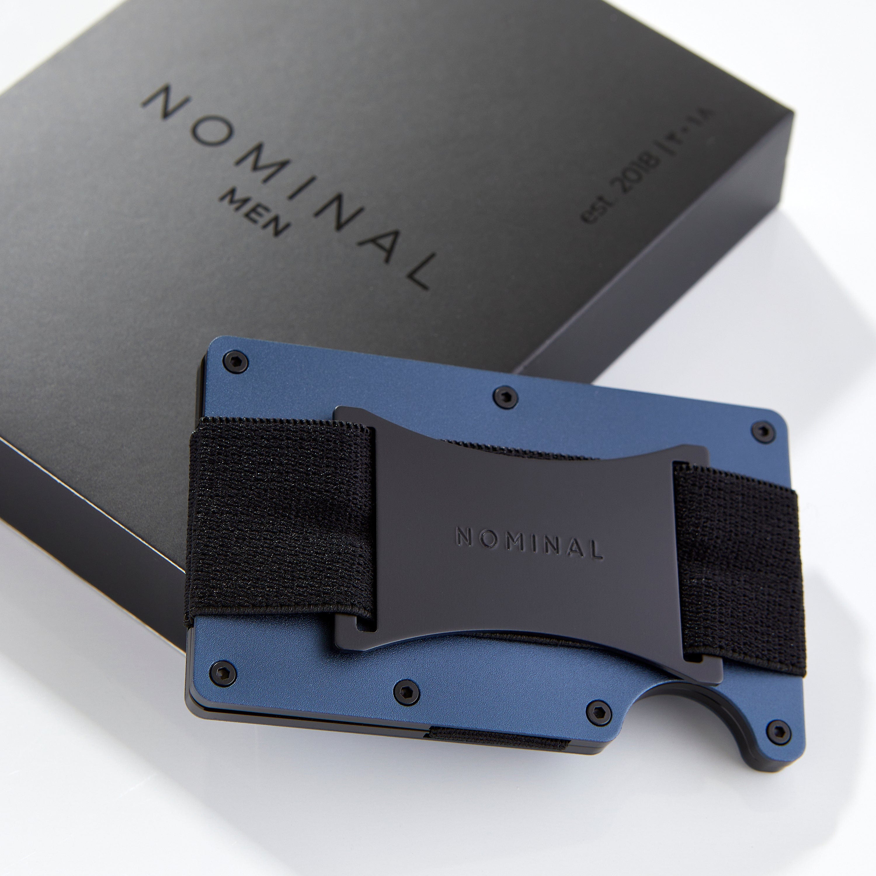 Side view of the Everlast Minimalist Wallet highlighting its compact size and aluminum finish.