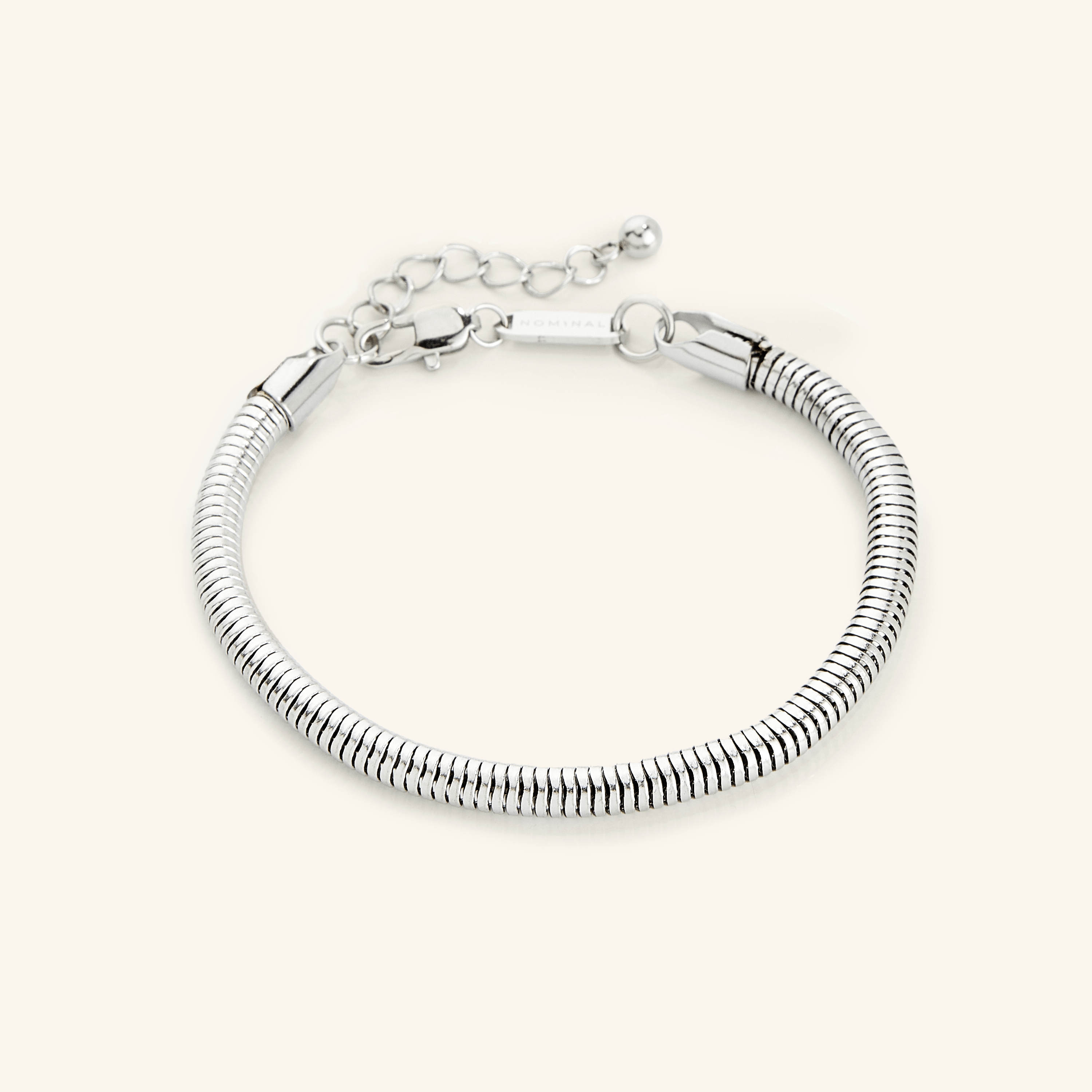 Stylishly displayed gold bracelet in a velvet pouch, ideal for gifting or personal use.