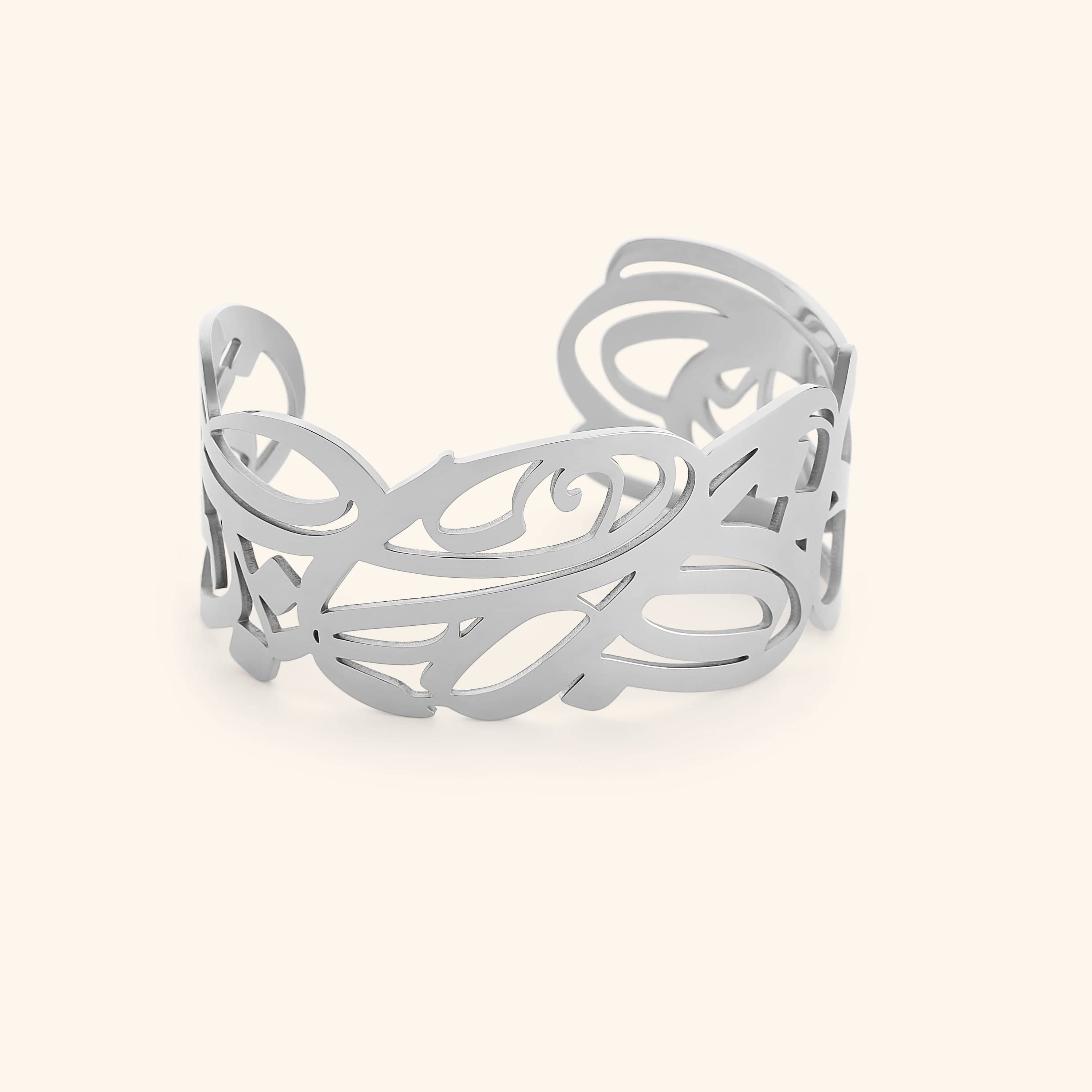 Elysian Grace Cuff showcasing Arabic calligraphy, perfect for sensitive skin.