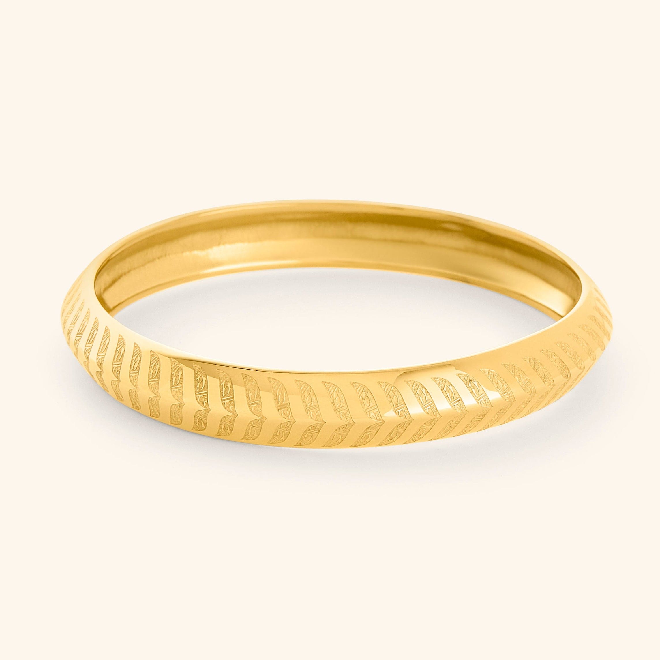 Profile view of Kun Faya Kun Gold Bangle with Arabic calligraphy