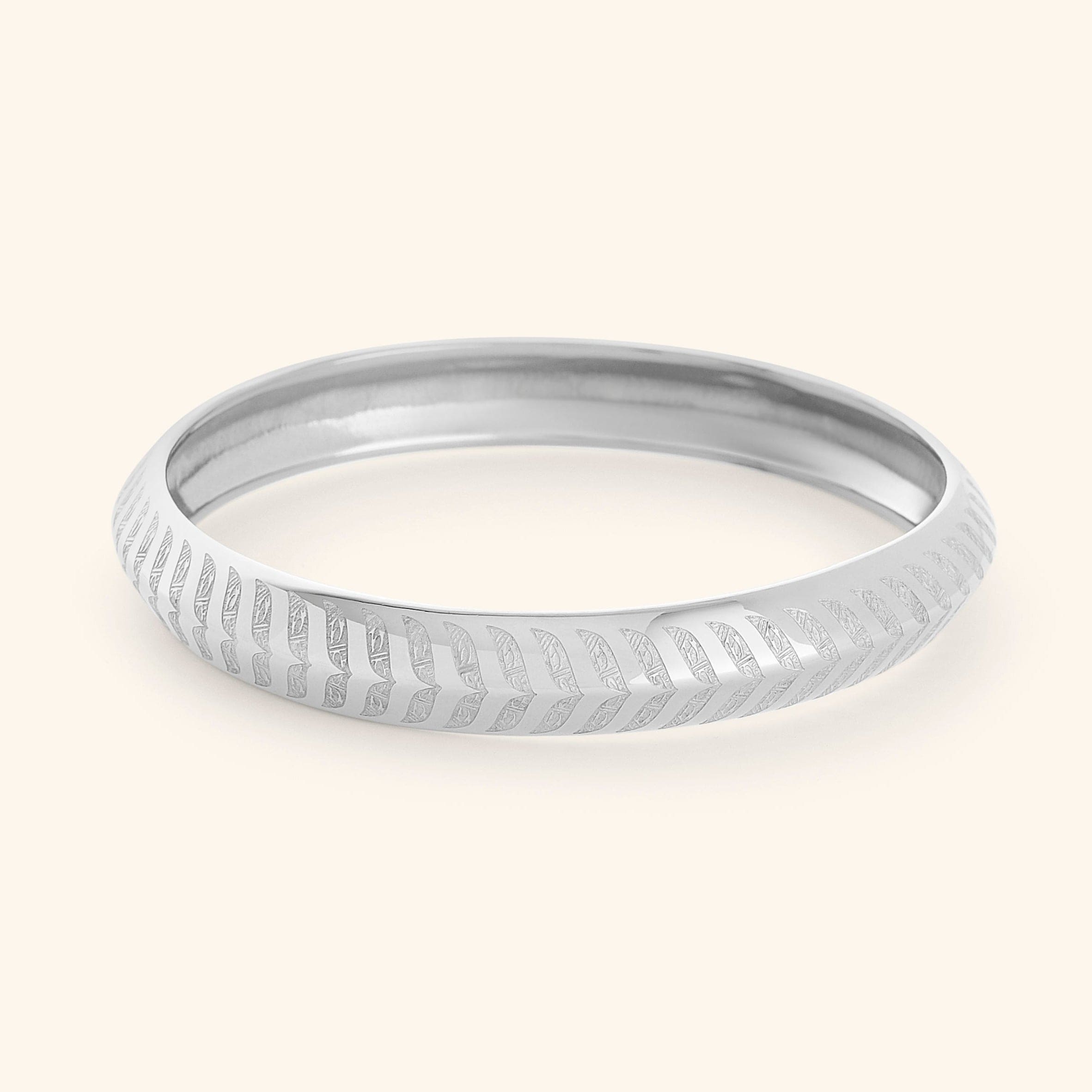 Close-up of the intricate design on the Kun Faya Kun Bangle