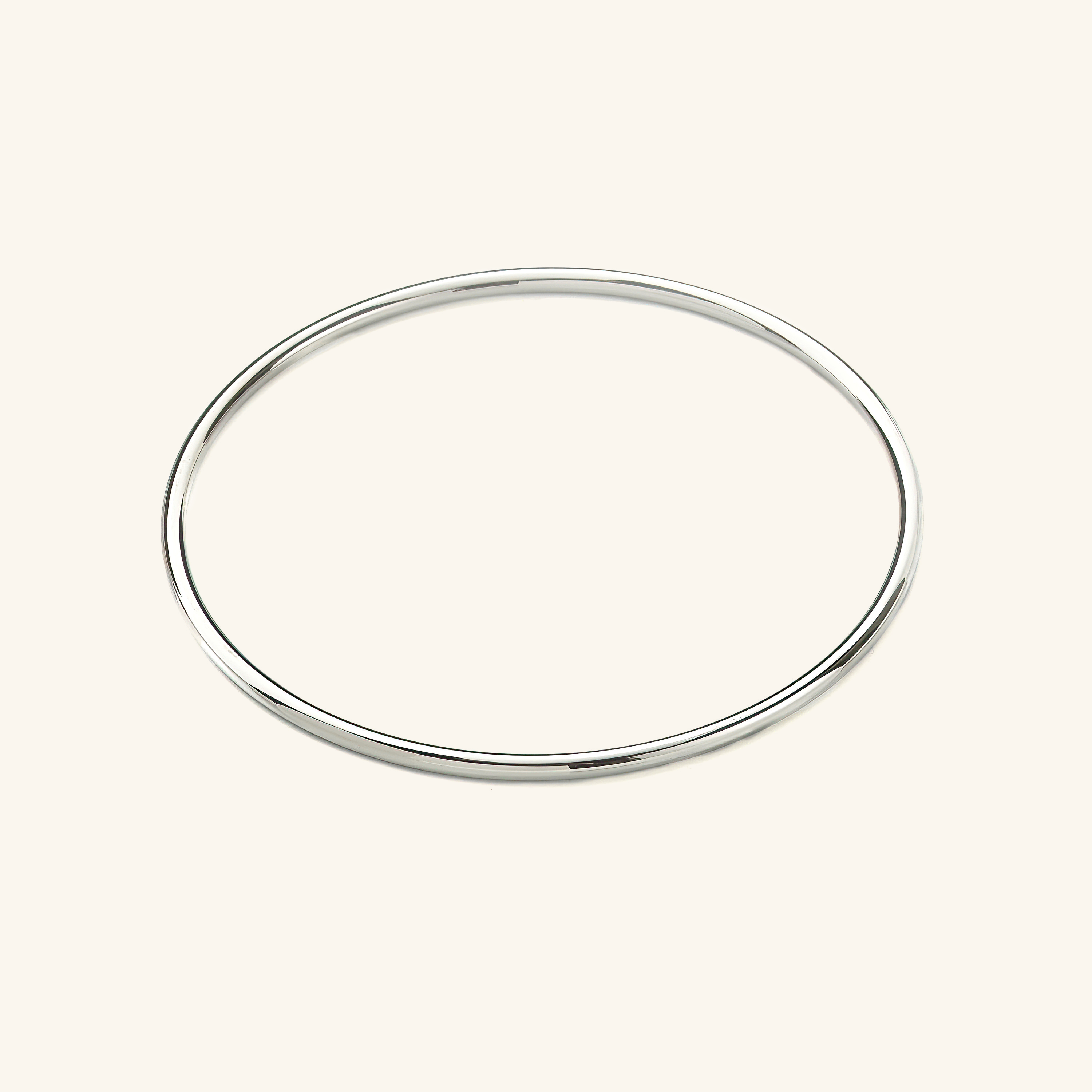 Close-up of the waterproof gold bangle highlighting its shine