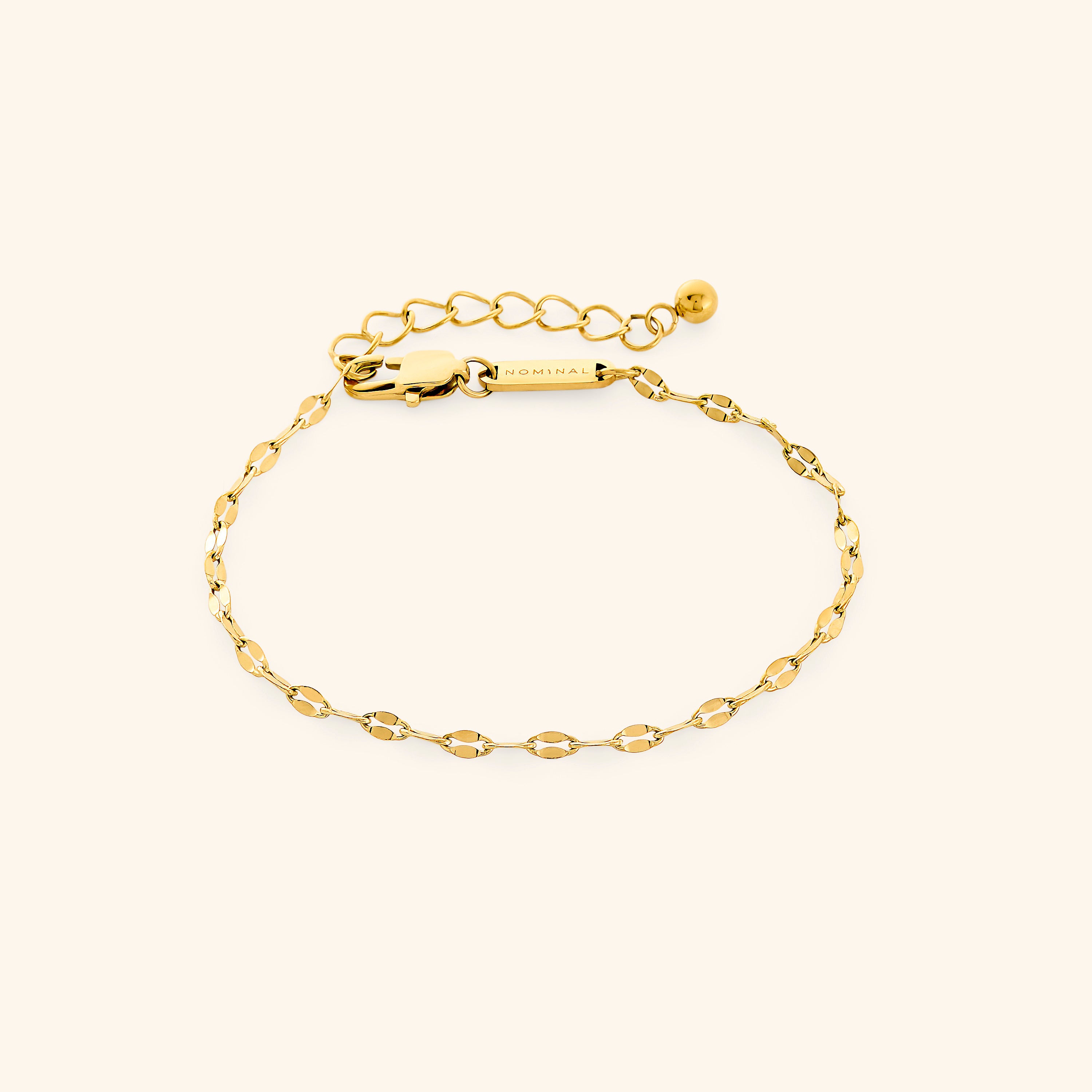 Close-up of the Gleaming Flutter Gold Chain Bracelet showcasing its intricate design and shine.