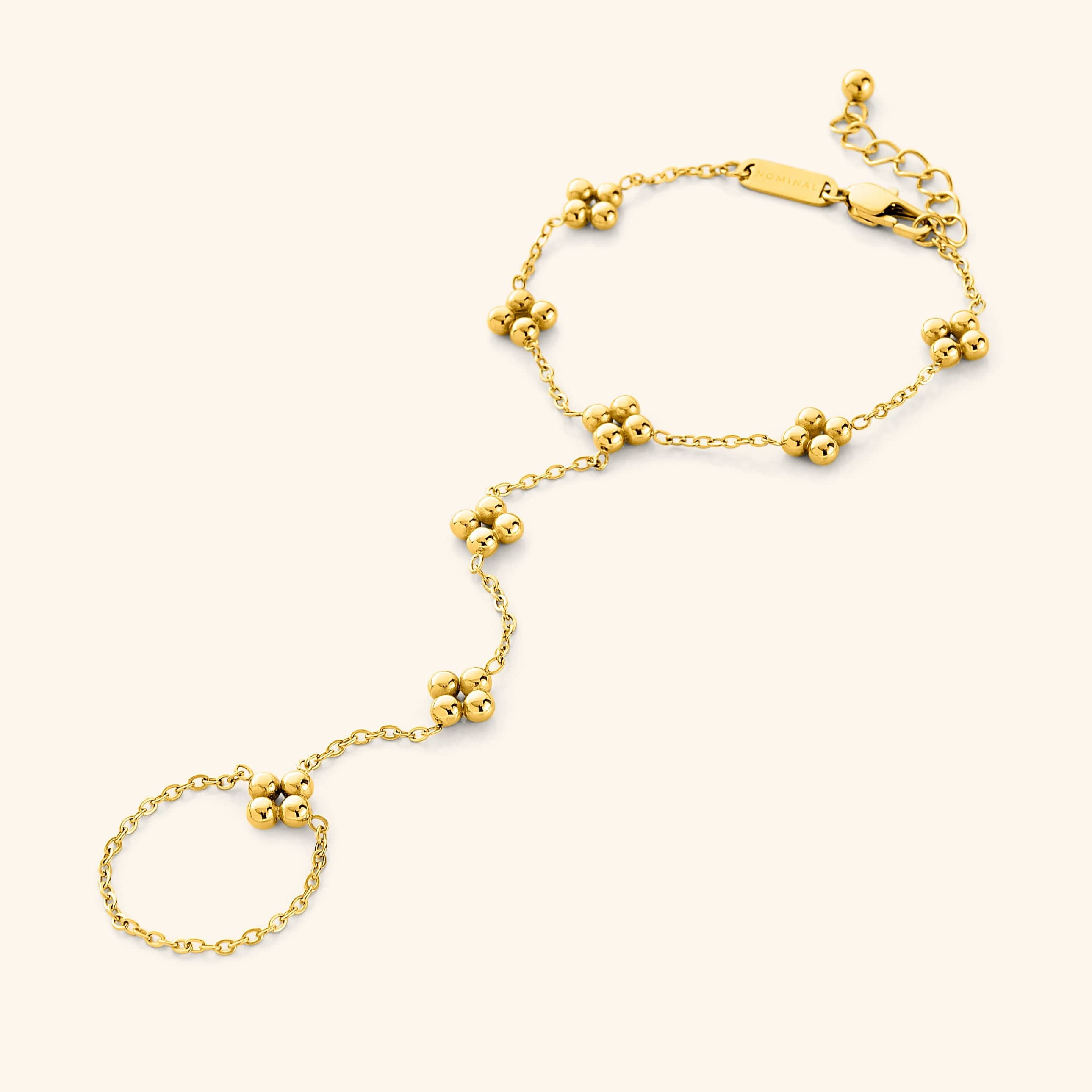 Close-up of the bohemian henna hand chain showcasing the clover cluster design.
