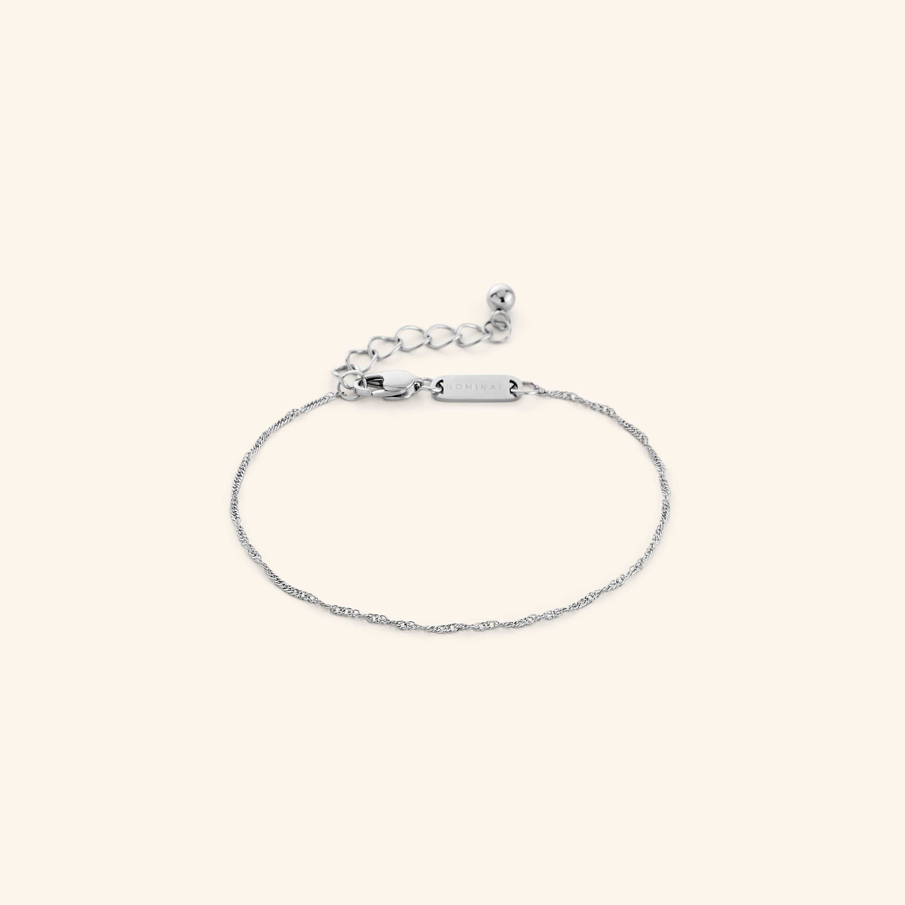 Close-up of the gold bracelet highlighting its hypoallergenic features.