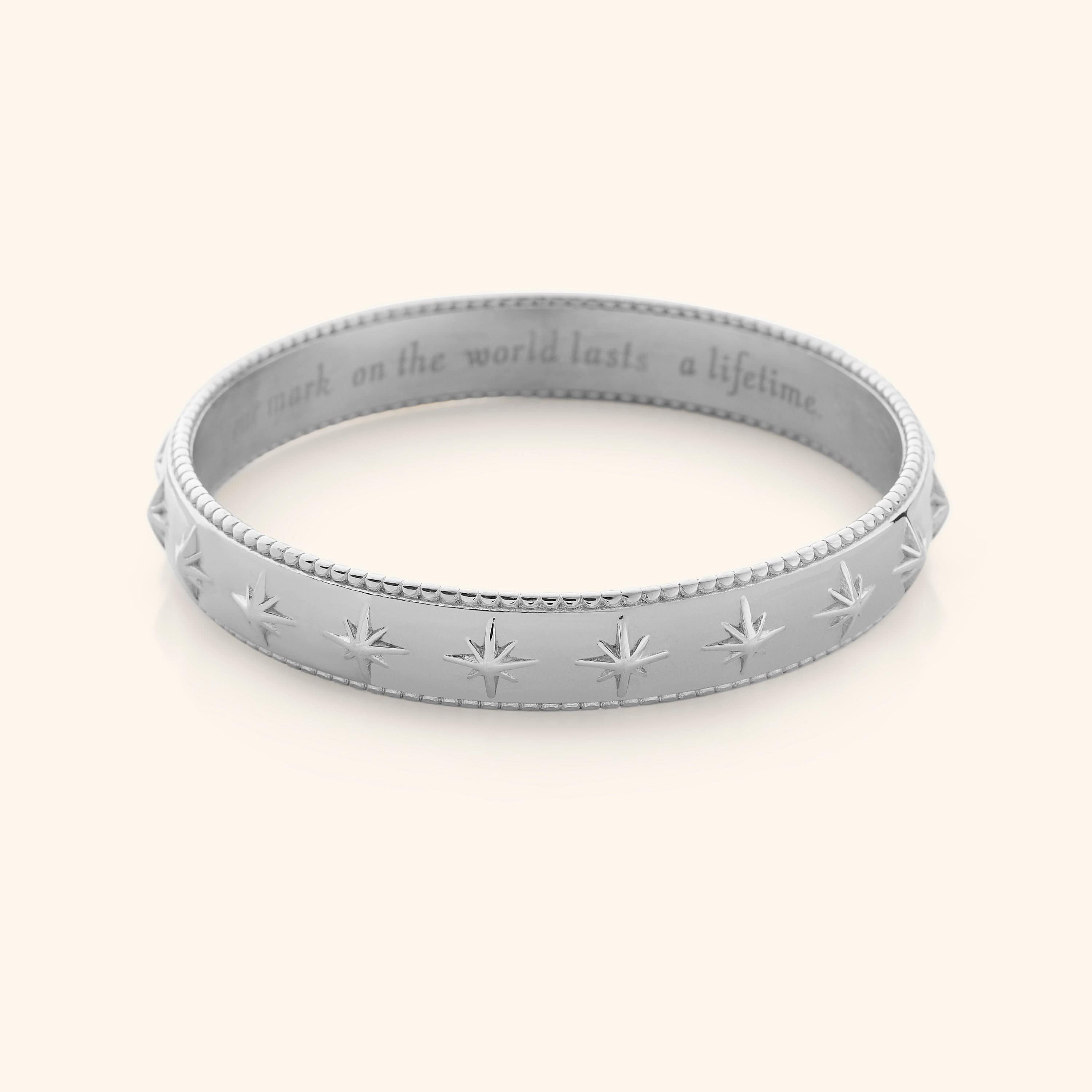 Model wearing the Eternal Impact Bangle, ideal for sensitive skin.