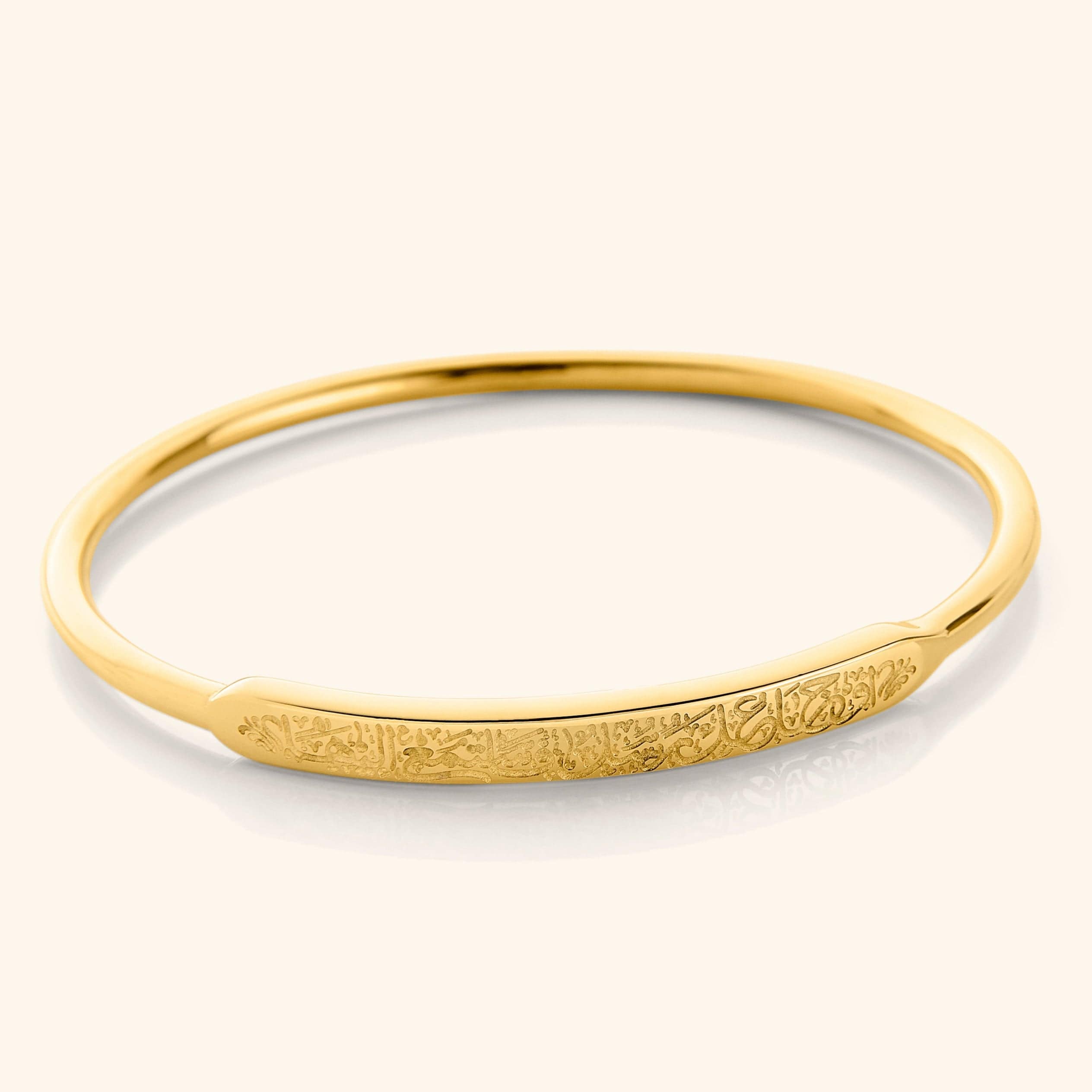 Close-up of Rumi's Wisdom Resilience Bracelet showing the engraved quote on the inside.