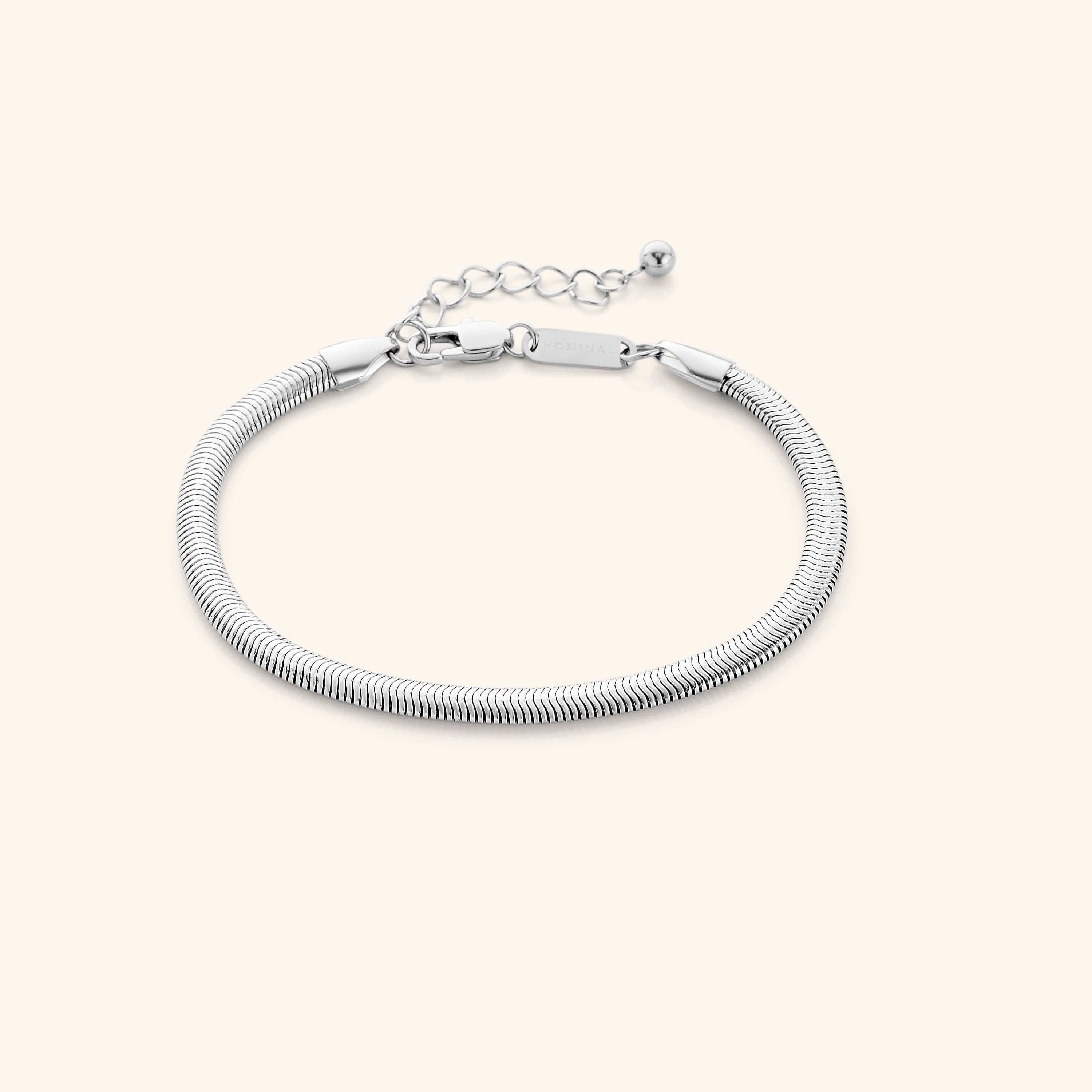 Liquid Gold Rounded Snake Bracelet in a velvet pouch, perfect for gifting.