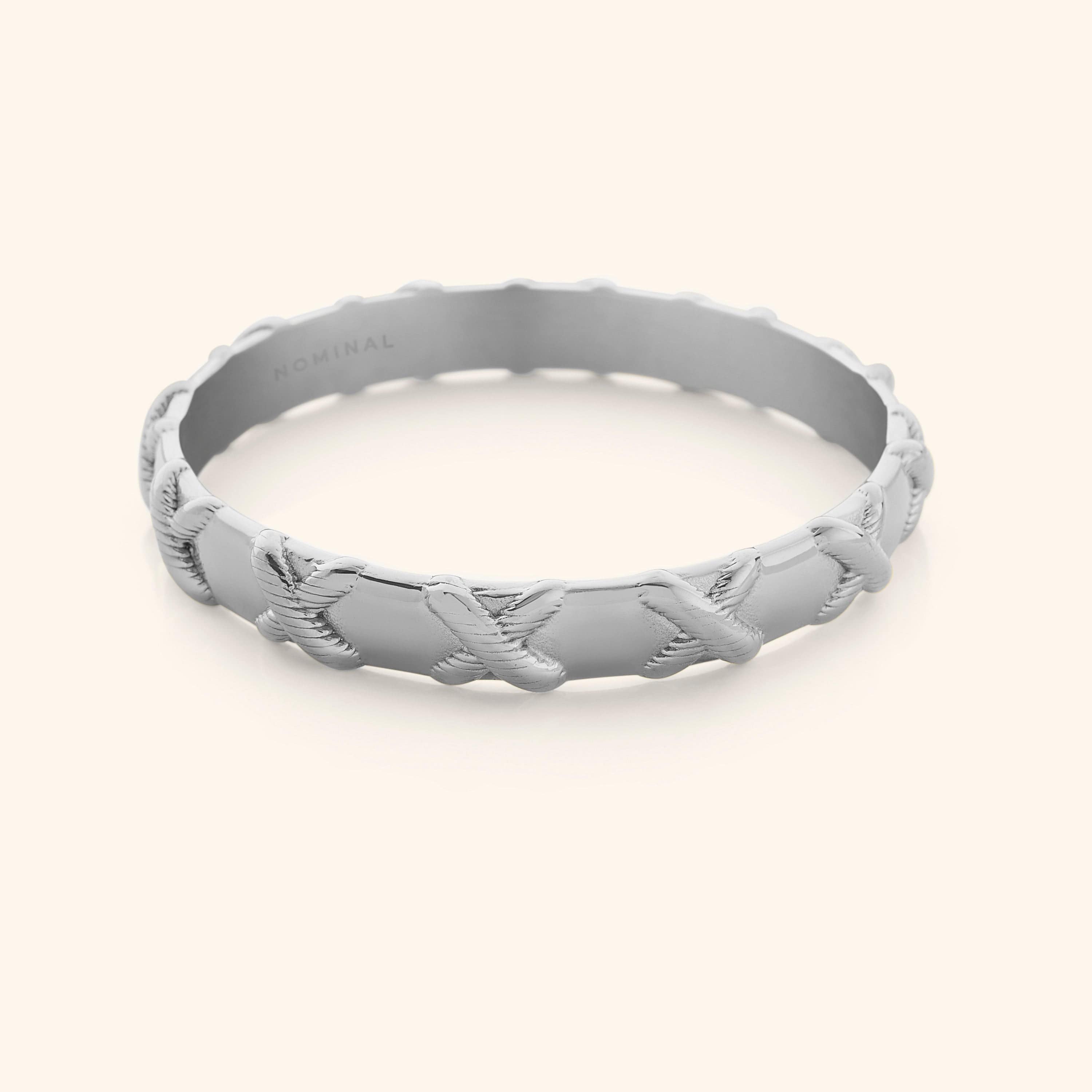 Stylish gold bangle worn during a casual outing to enhance any outfit.