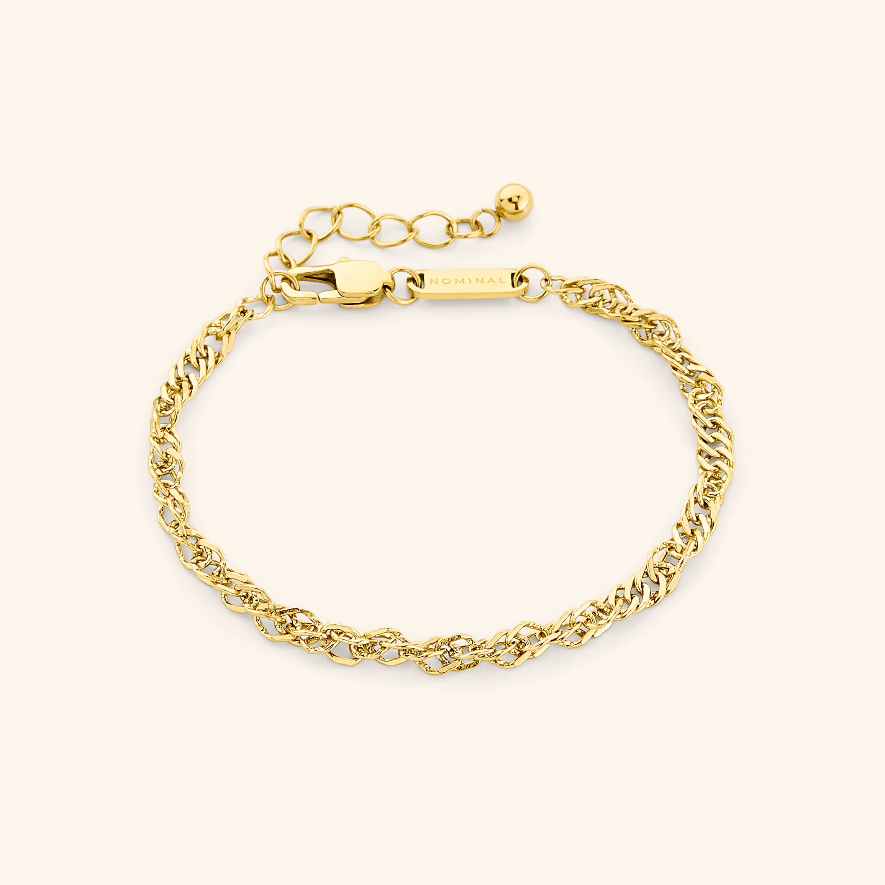 RadianceTwist™ bracelet worn on wrist — ideal for casual layering with other gold jewelry.