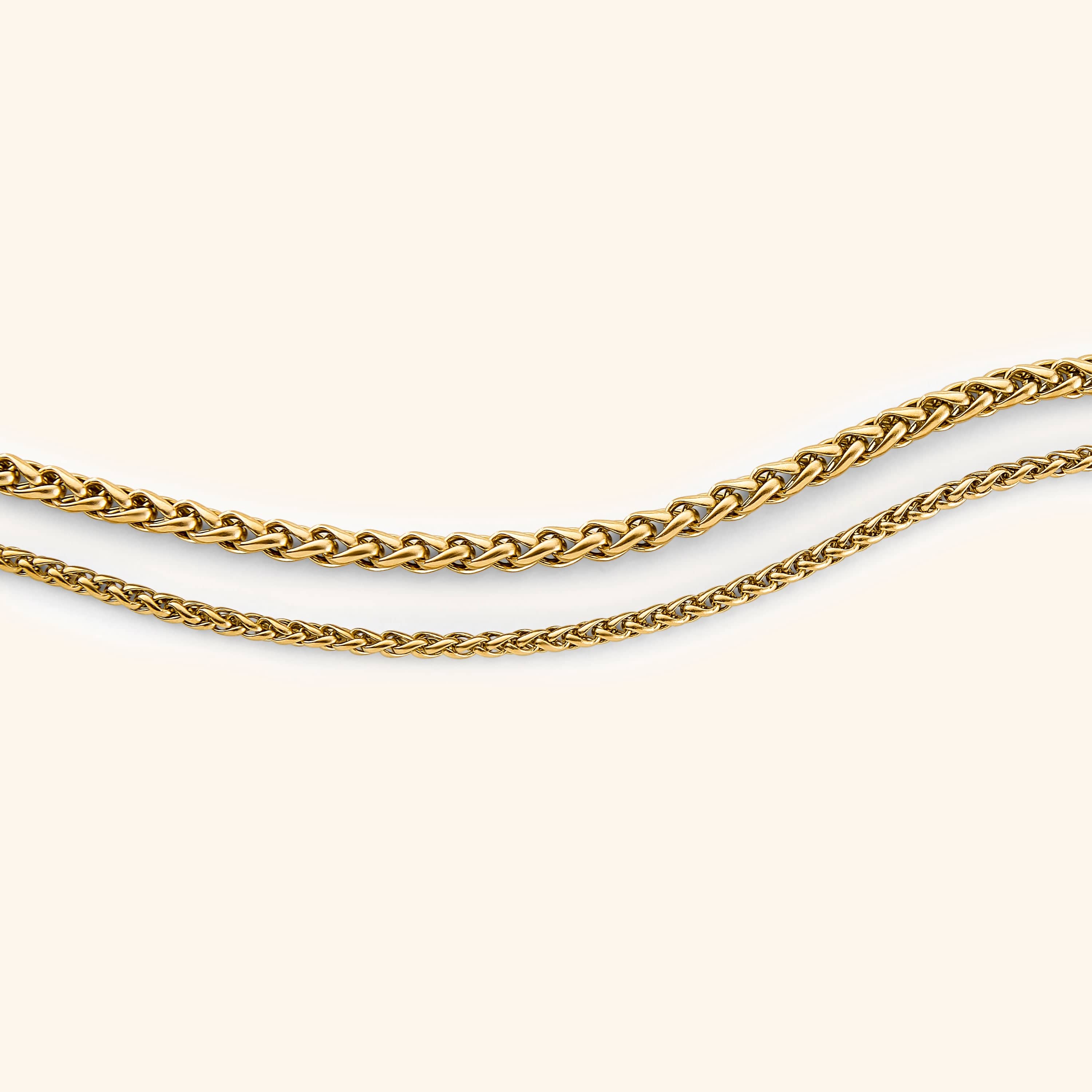 A woman wearing the premium wheat chain bracelet, highlighting its versatility for daily wear.