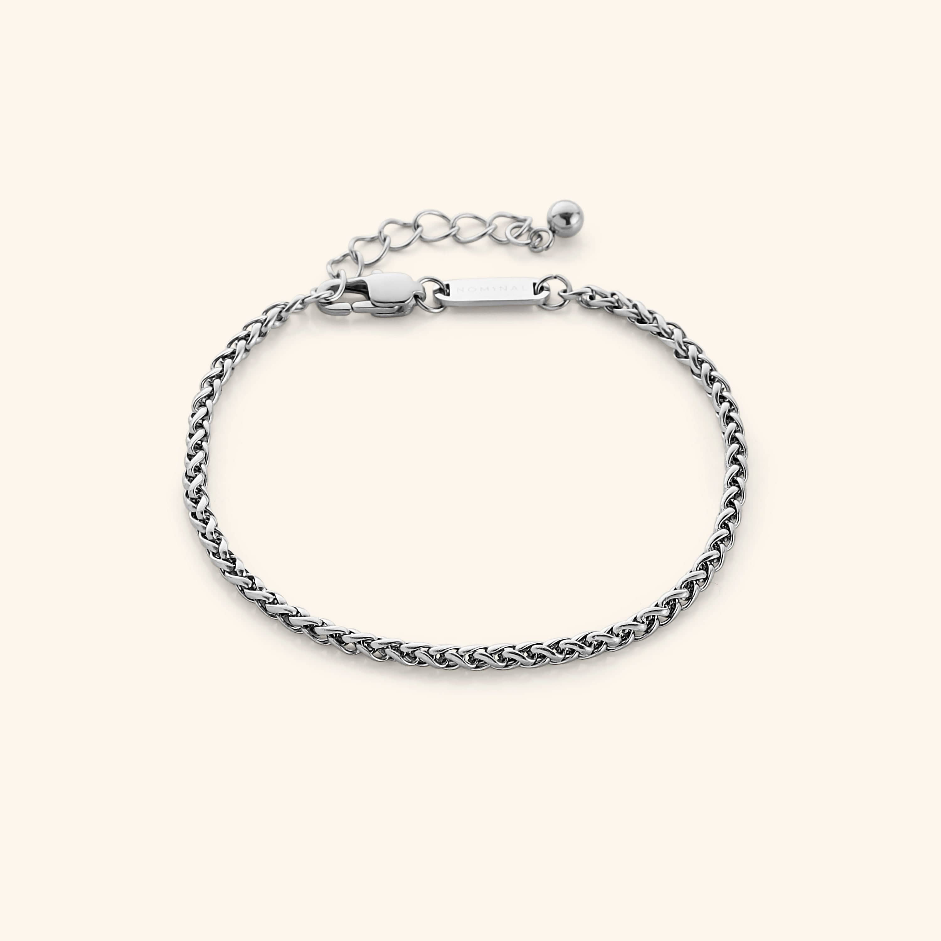 Close-up of the elegant premium wheat chain bracelet showcasing its smooth woven design.