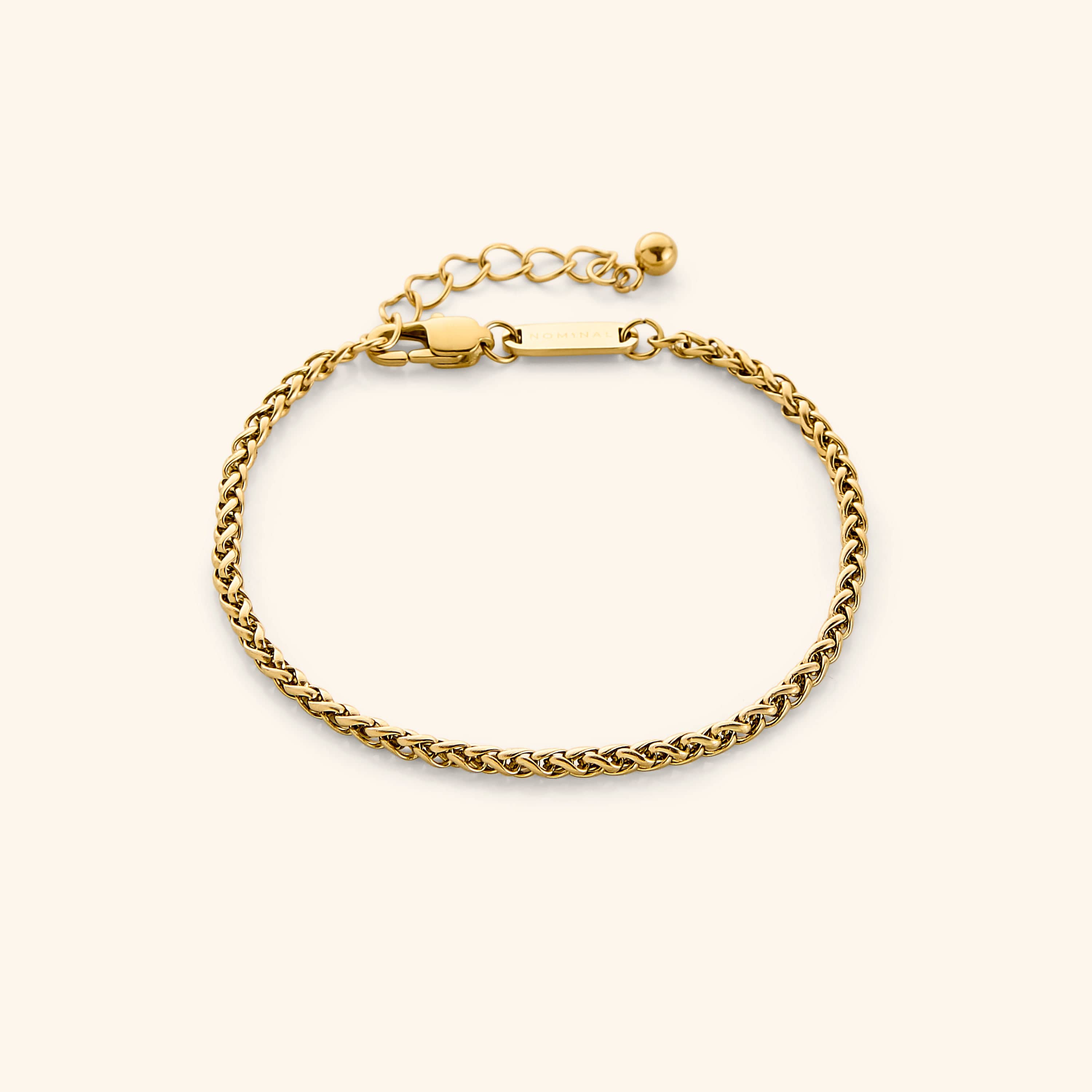 Close-up of the elegant premium wheat chain bracelet showcasing its smooth woven design.