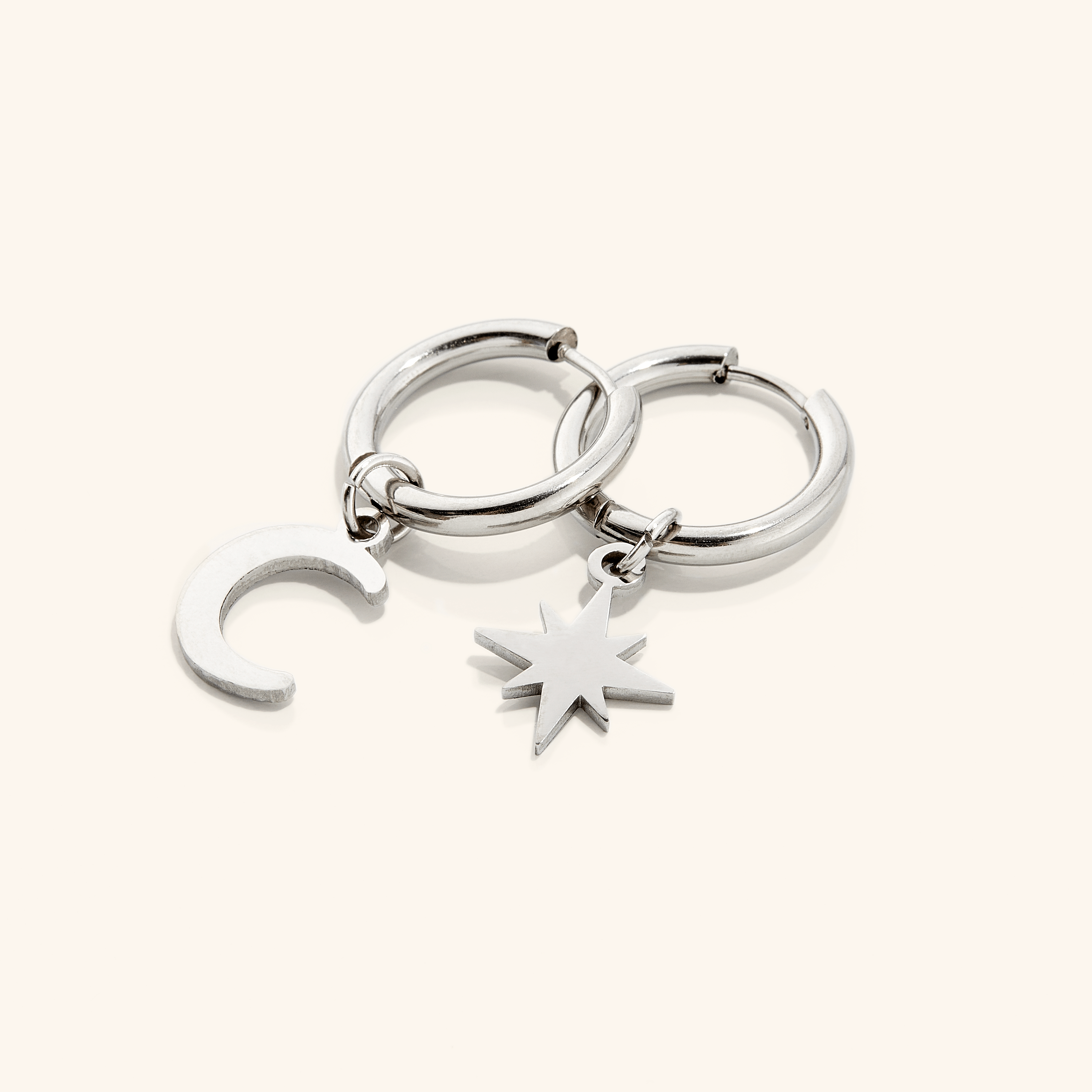 Celestial Gold Hoop Earrings displayed in a velvet pouch, perfect for gifts