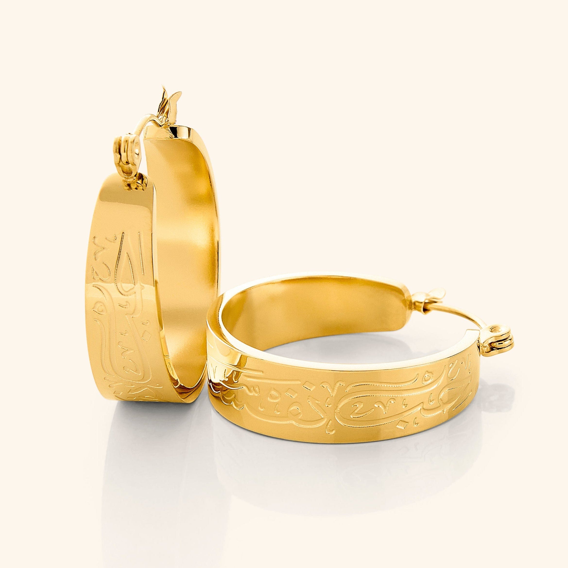 Close-up of Self-Love Hoop Earrings showcasing the Arabic inscription.