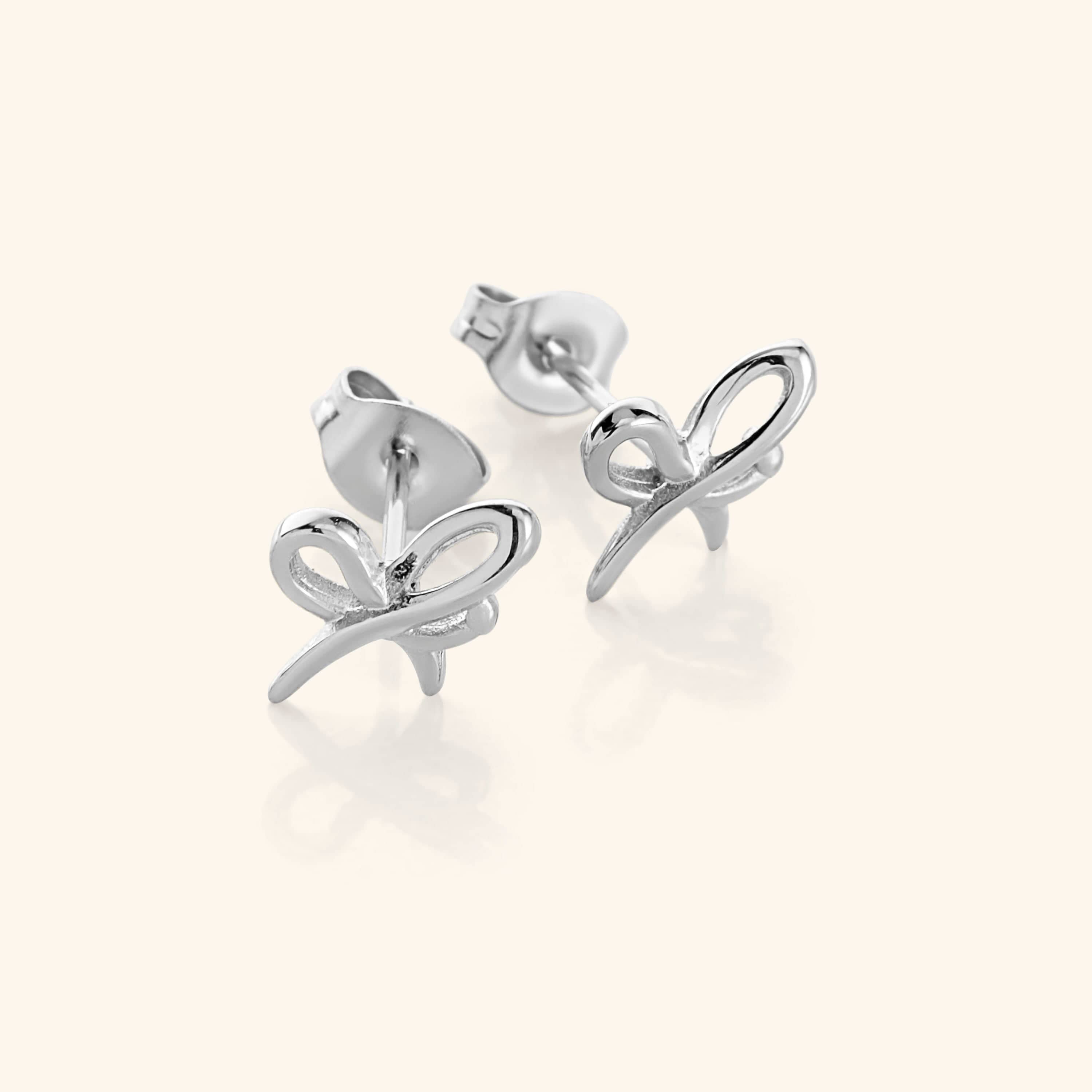 Fashionable Mama Ribbon Studs worn by a model, perfect for everyday style.