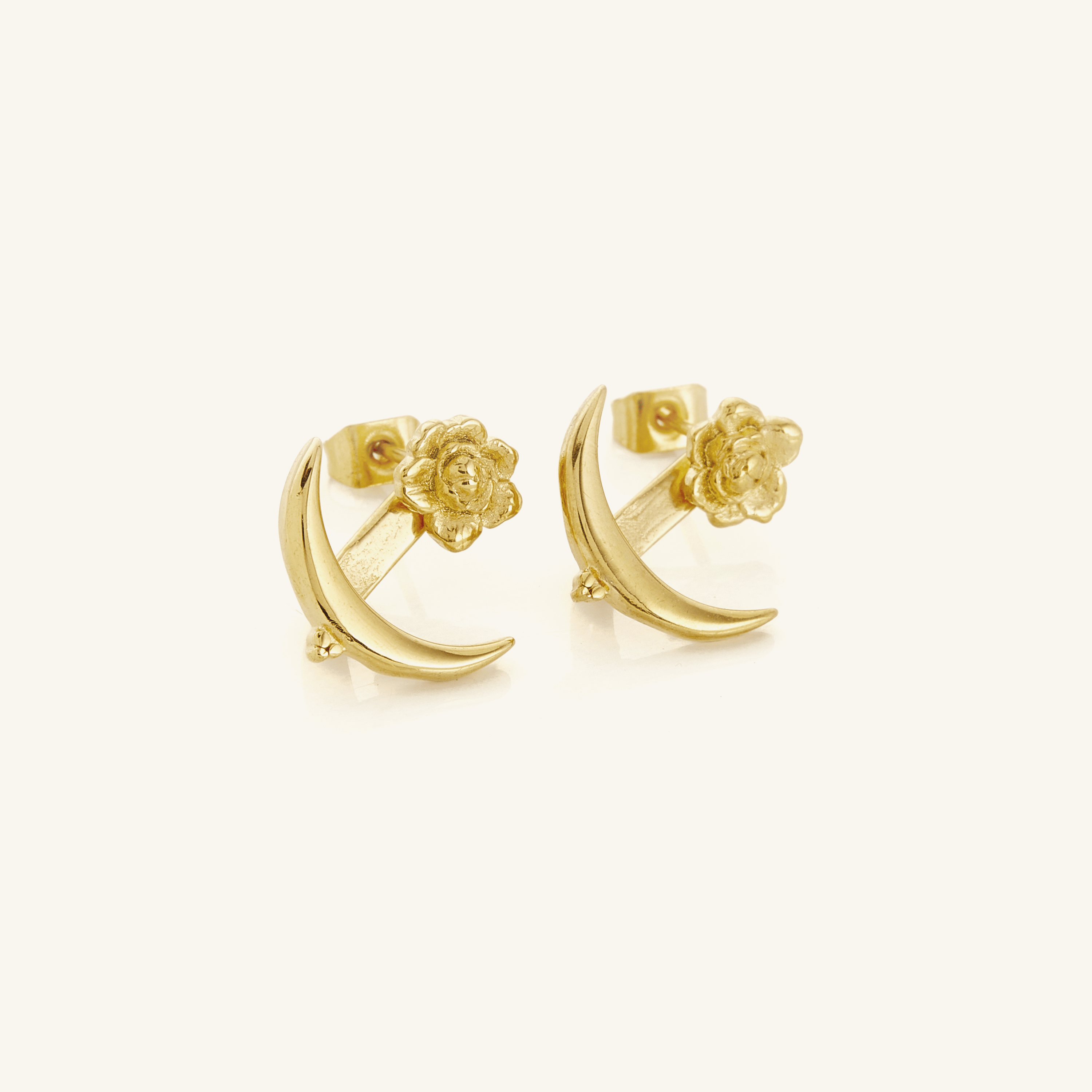 Elegant Crescent Moon & Damask Rose Earrings showcasing intricate design and cultural motifs.