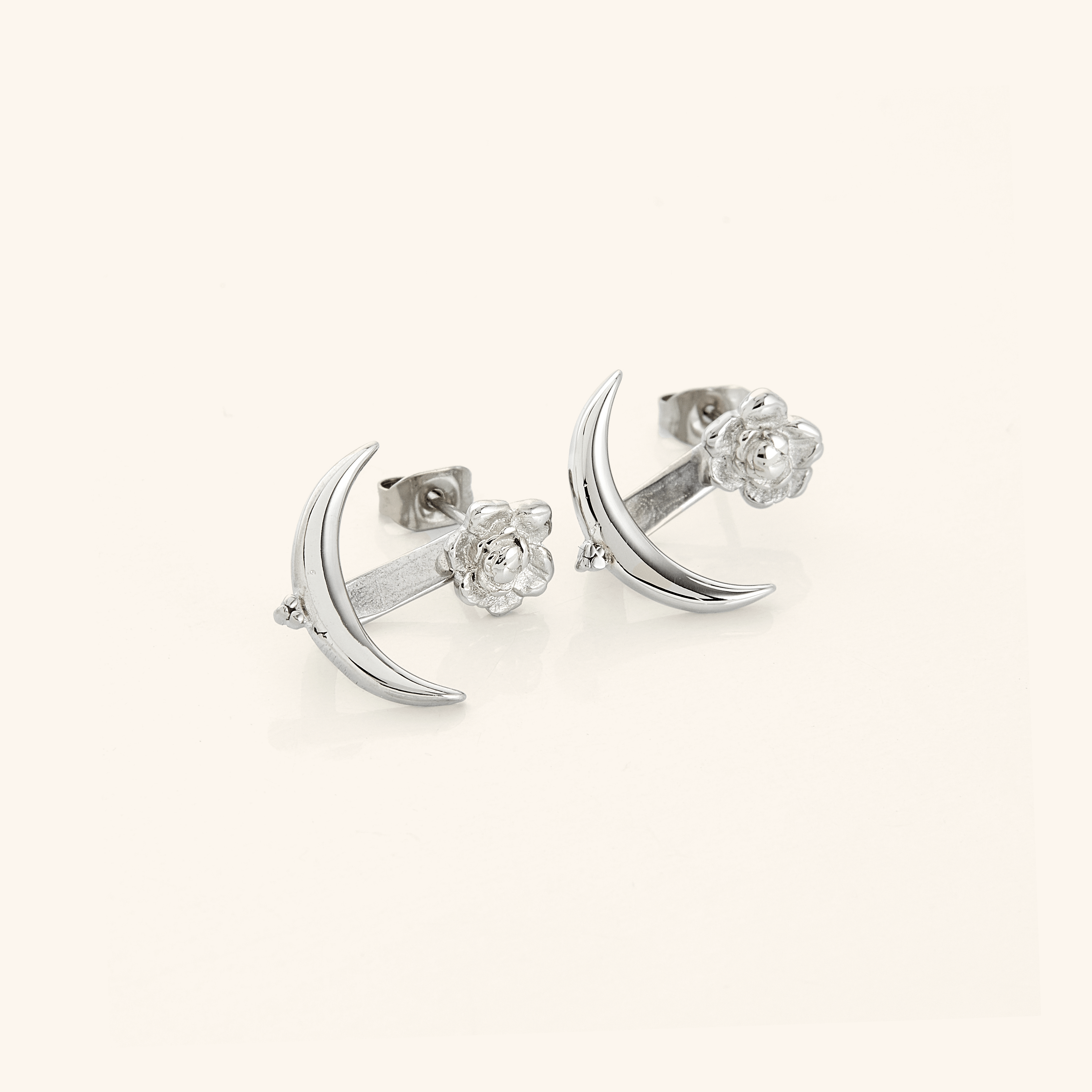 Worn Crescent Moon & Damask Rose Earrings, perfect for any occasion, emphasizing their versatility.