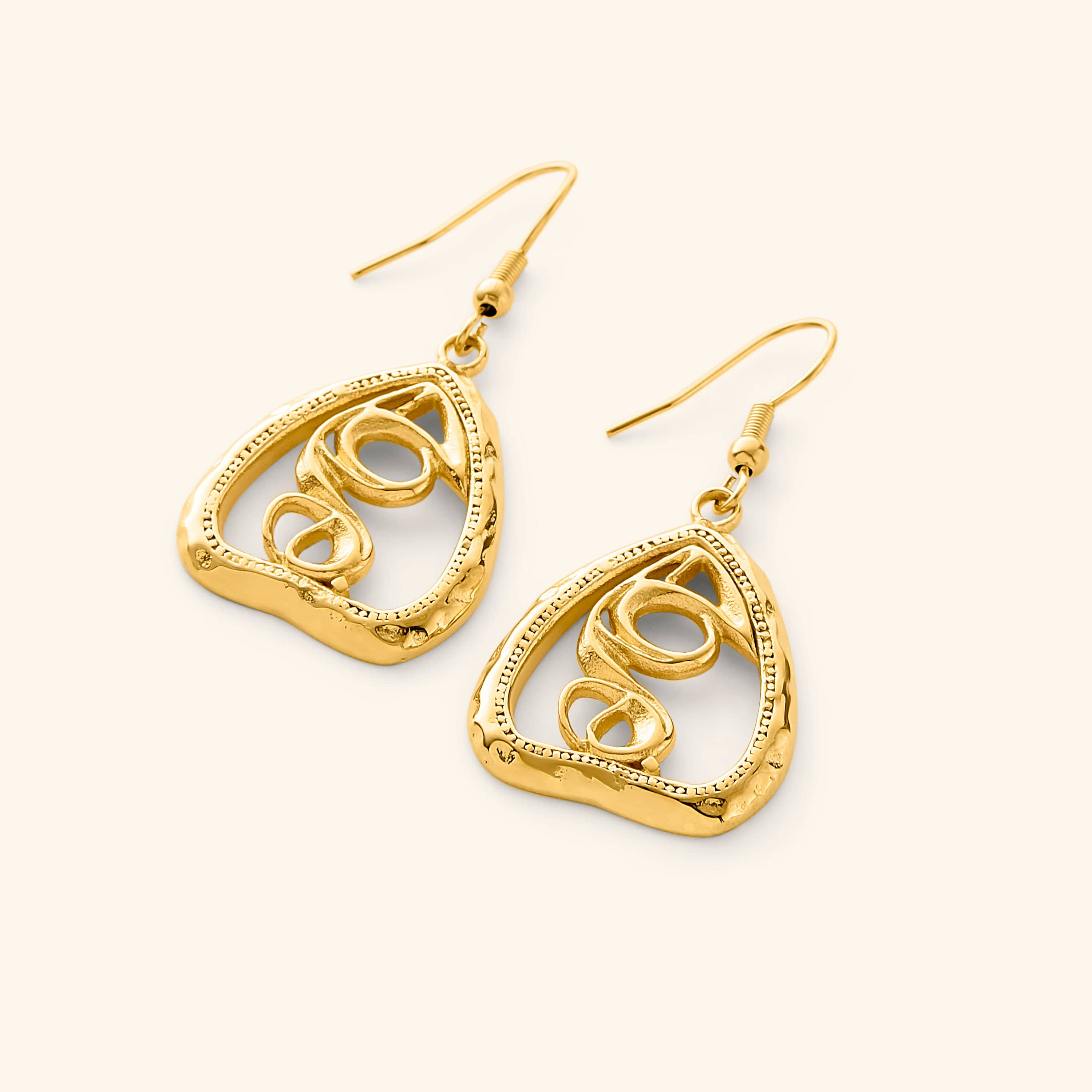 Close-up view of the Heartfelt Arabic Calligraphy Earrings showcasing the intricate design and gold plating.