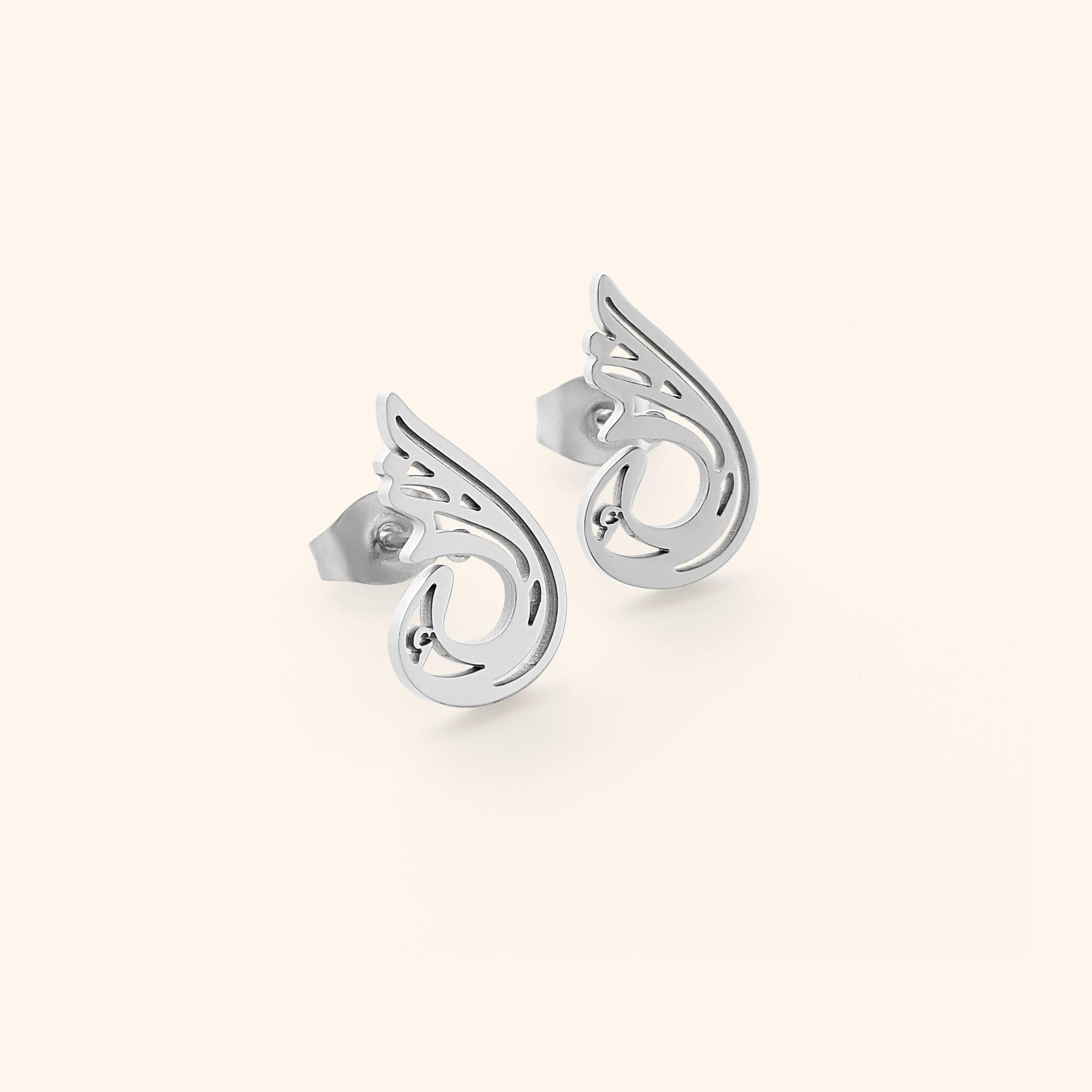 Close-up of Serenity earrings, highlighting the 18 Karat gold plating on pure stainless steel.