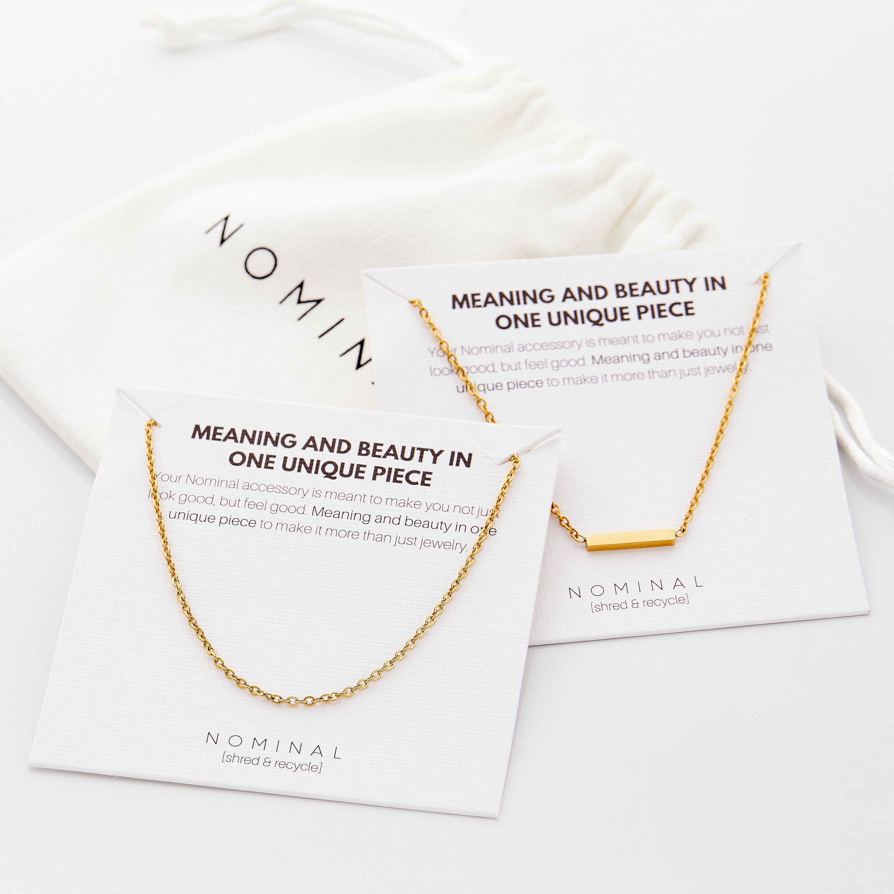 Gold necklace set styled with other jewelry pieces for an elegant look.