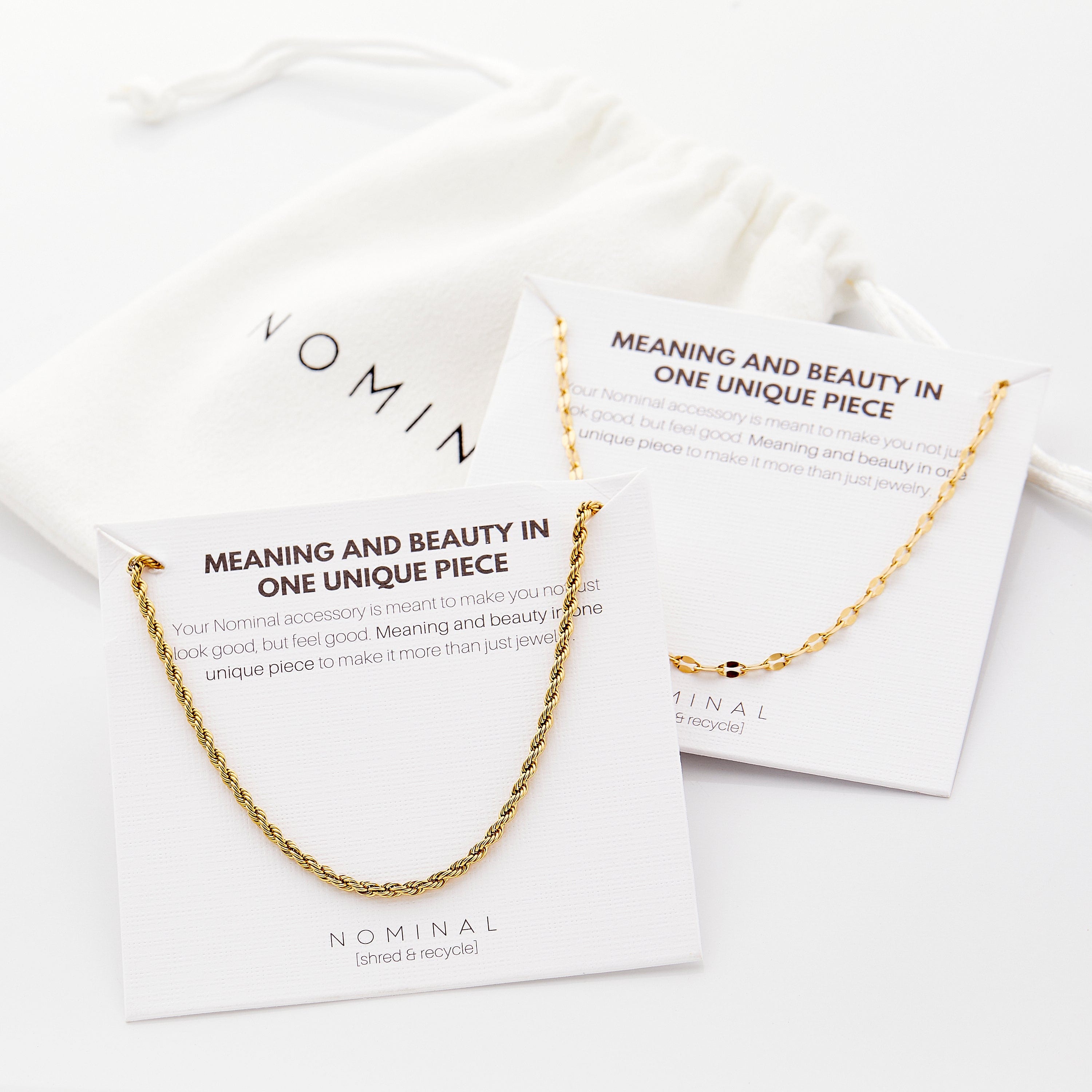 Both chains layered together, showcasing versatility in style