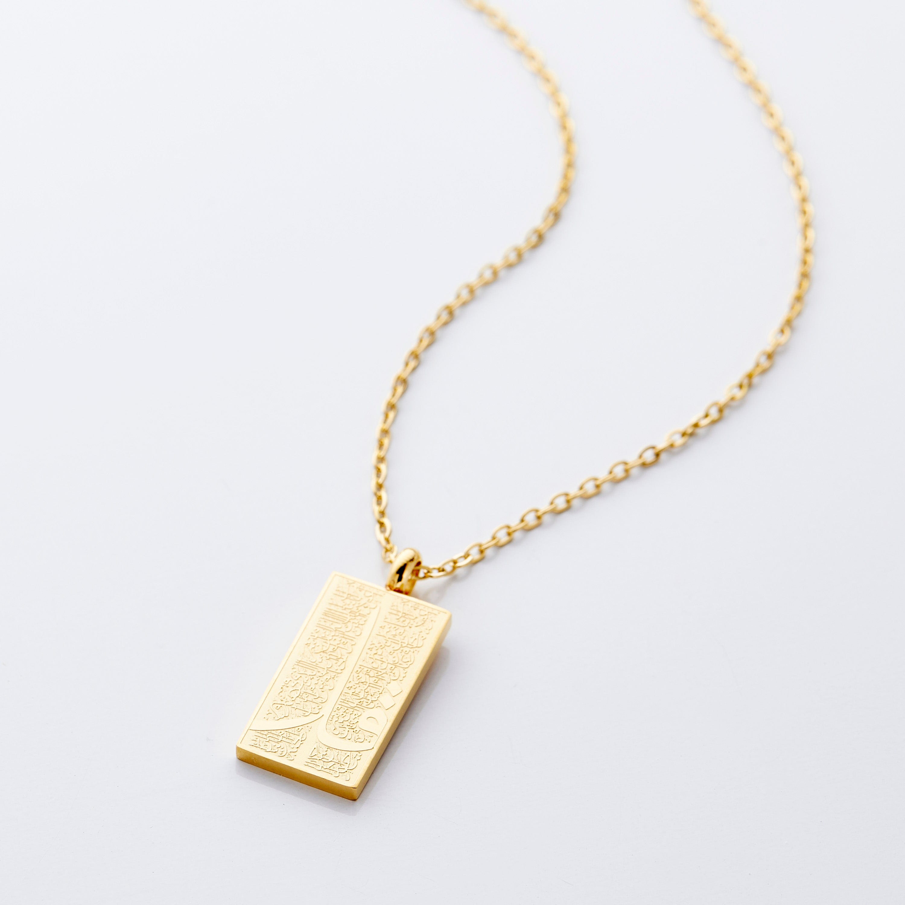Close-up of the elegant 4 Qul waterproof Quran necklace for women, showcasing the intricate design
