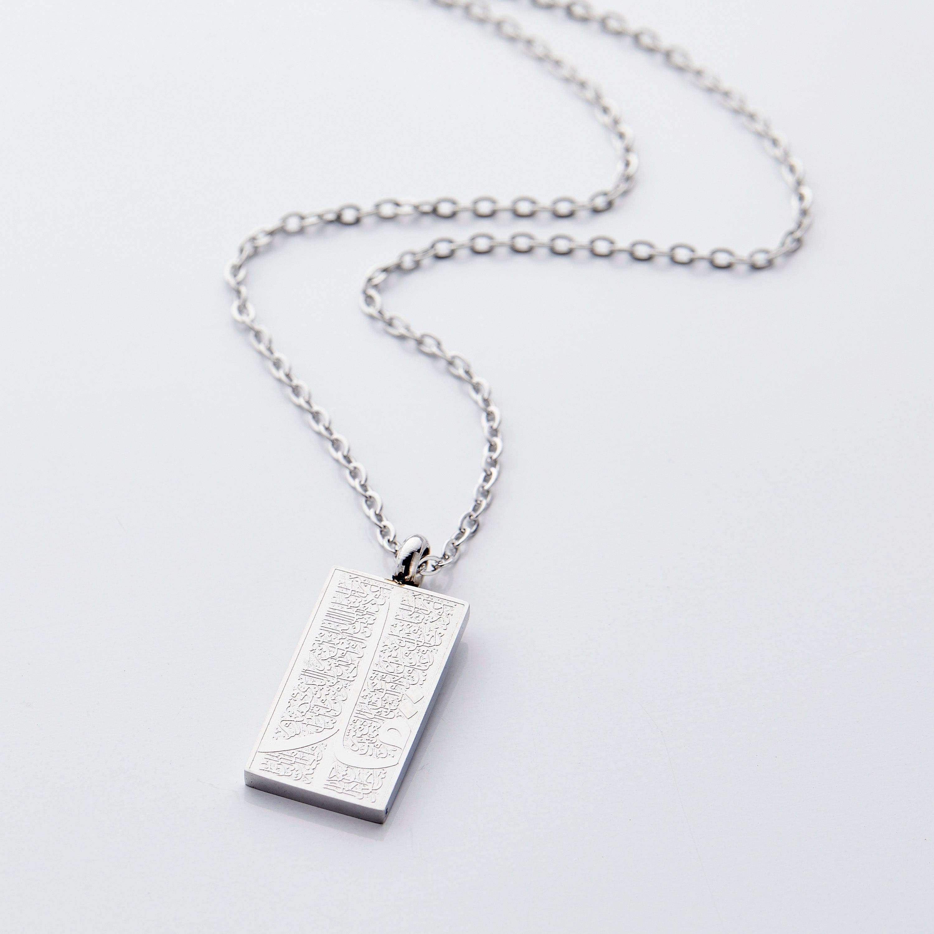 Stylish packaging of the 4 Qul necklace in a velvet pouch, perfect for gifting