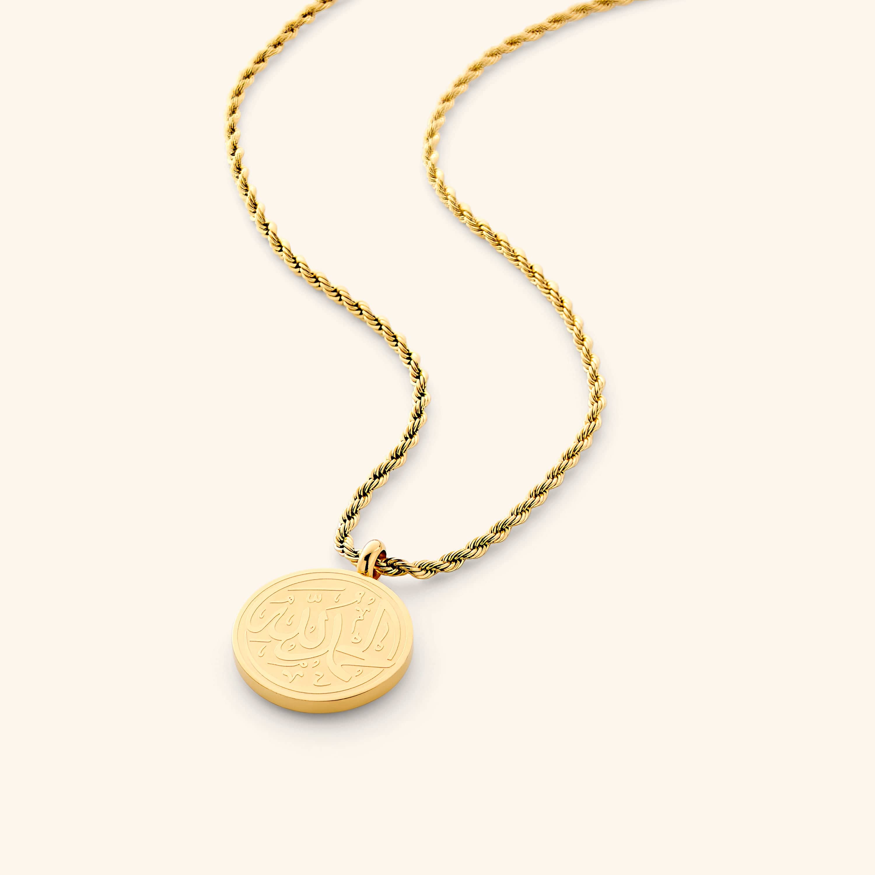Elegant Alhamdulillah Arabic calligraphy necklace on a model, highlighting its charm and versatility.