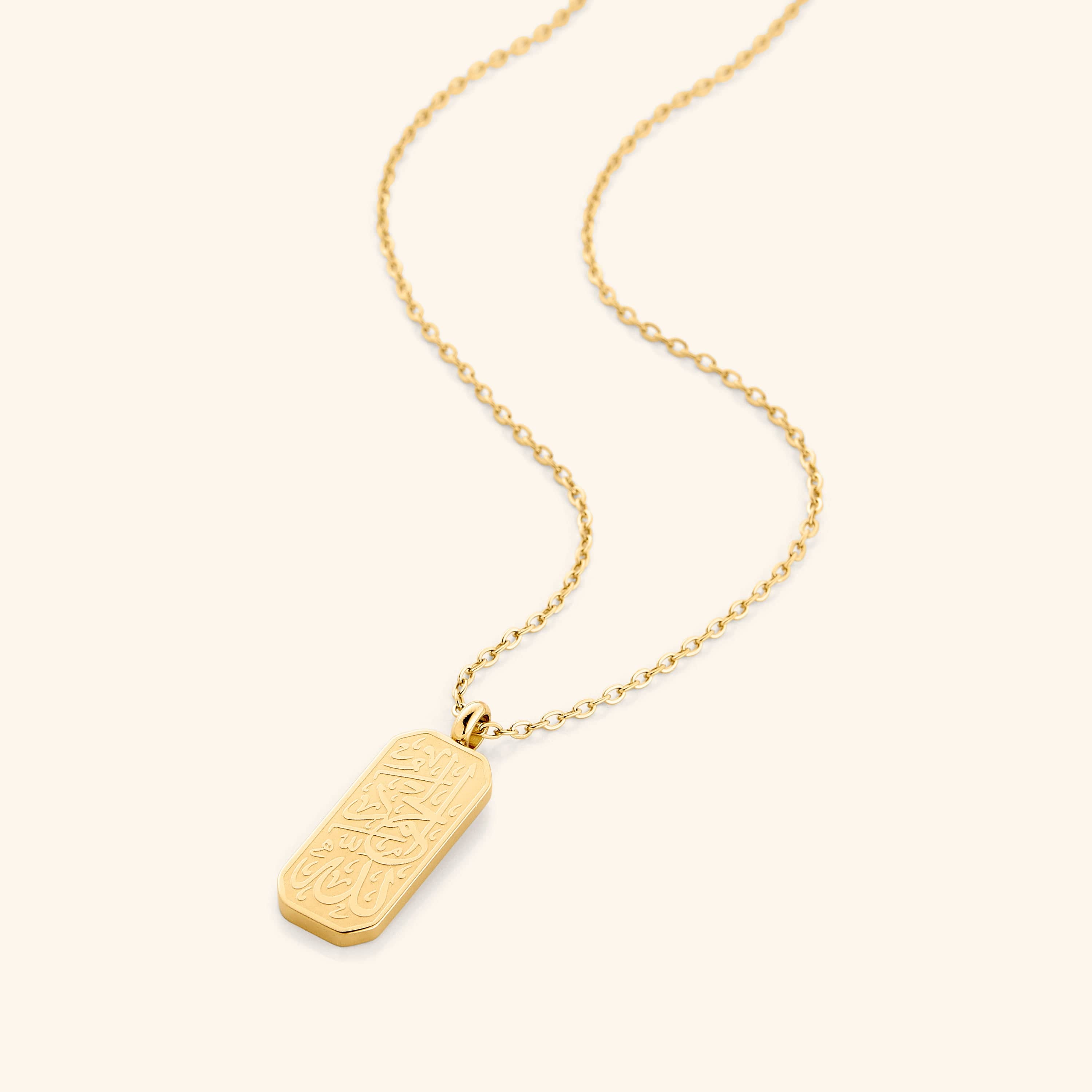 Elegant Alhamdulillah calligraphy pendant showcased against a velvet background.