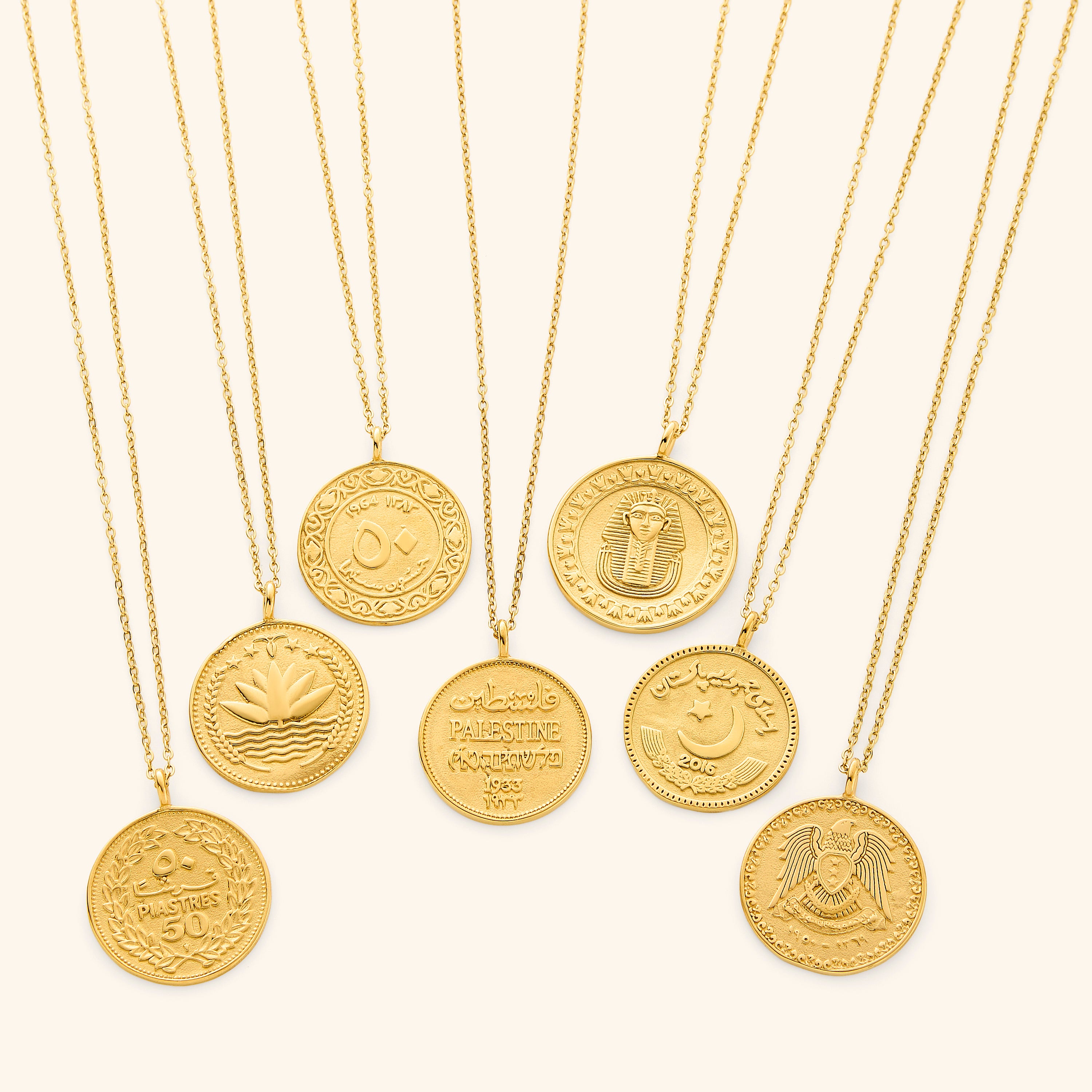 Close-up of the Heritage Coin Necklace showcasing its beautiful design and gold finish.