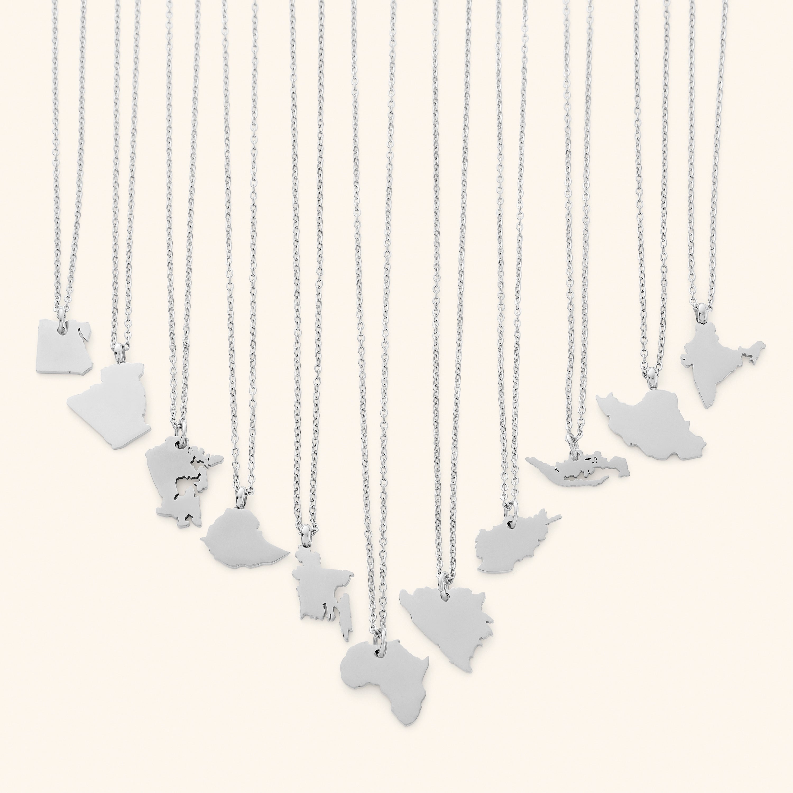 The necklace displayed on a velvet pouch, highlighting its luxurious packaging.