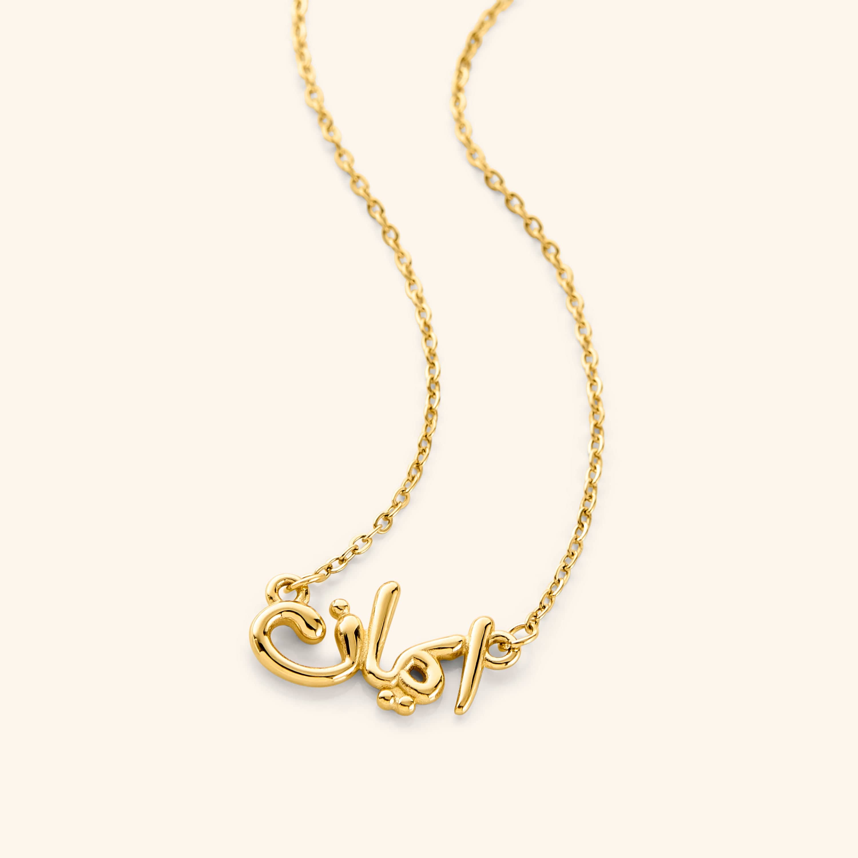 Faith bubble necklace displayed on a model, highlighting its elegant design and length.