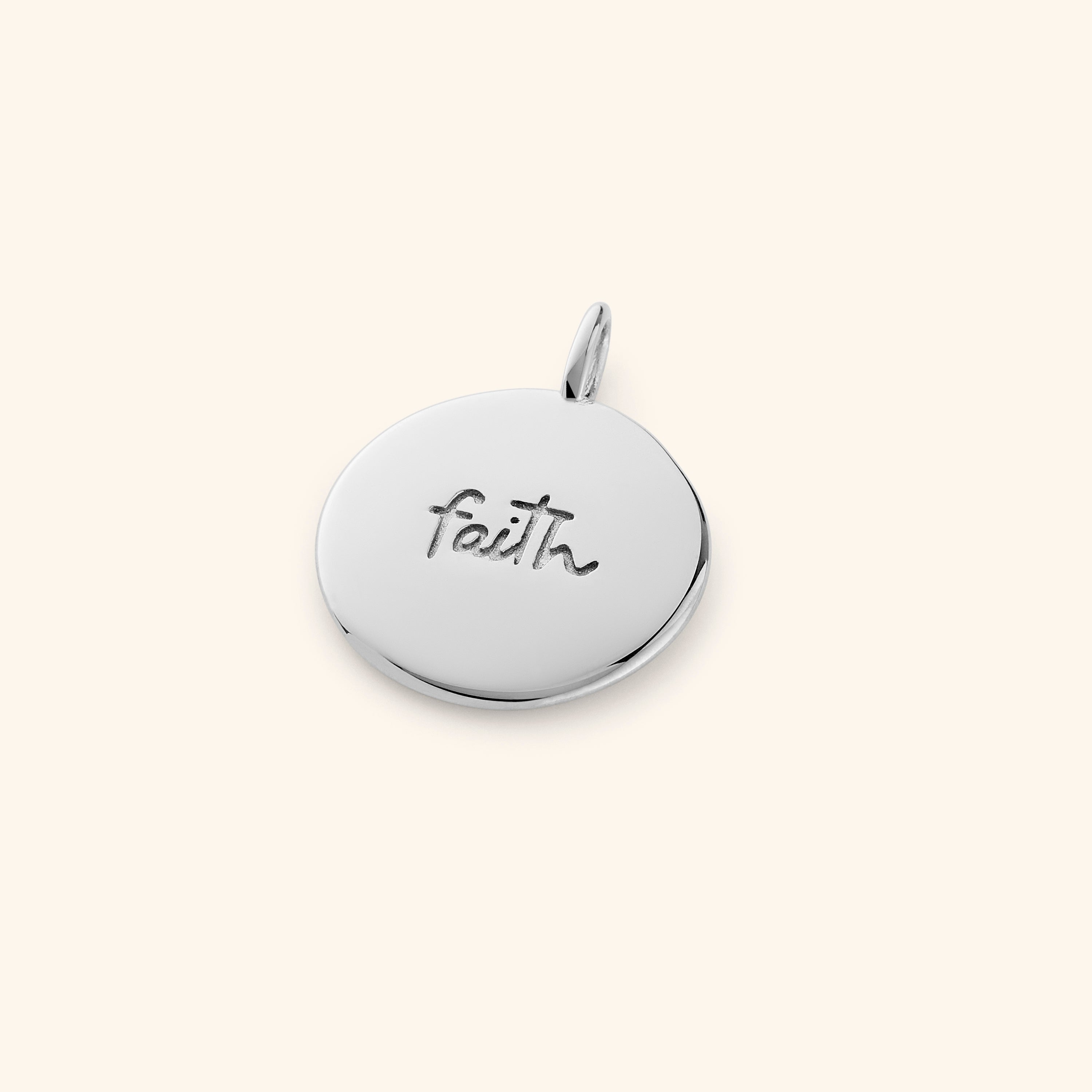 Packaging of the Iman Faith Charm in a stylish Nominal Velvet Pouch.