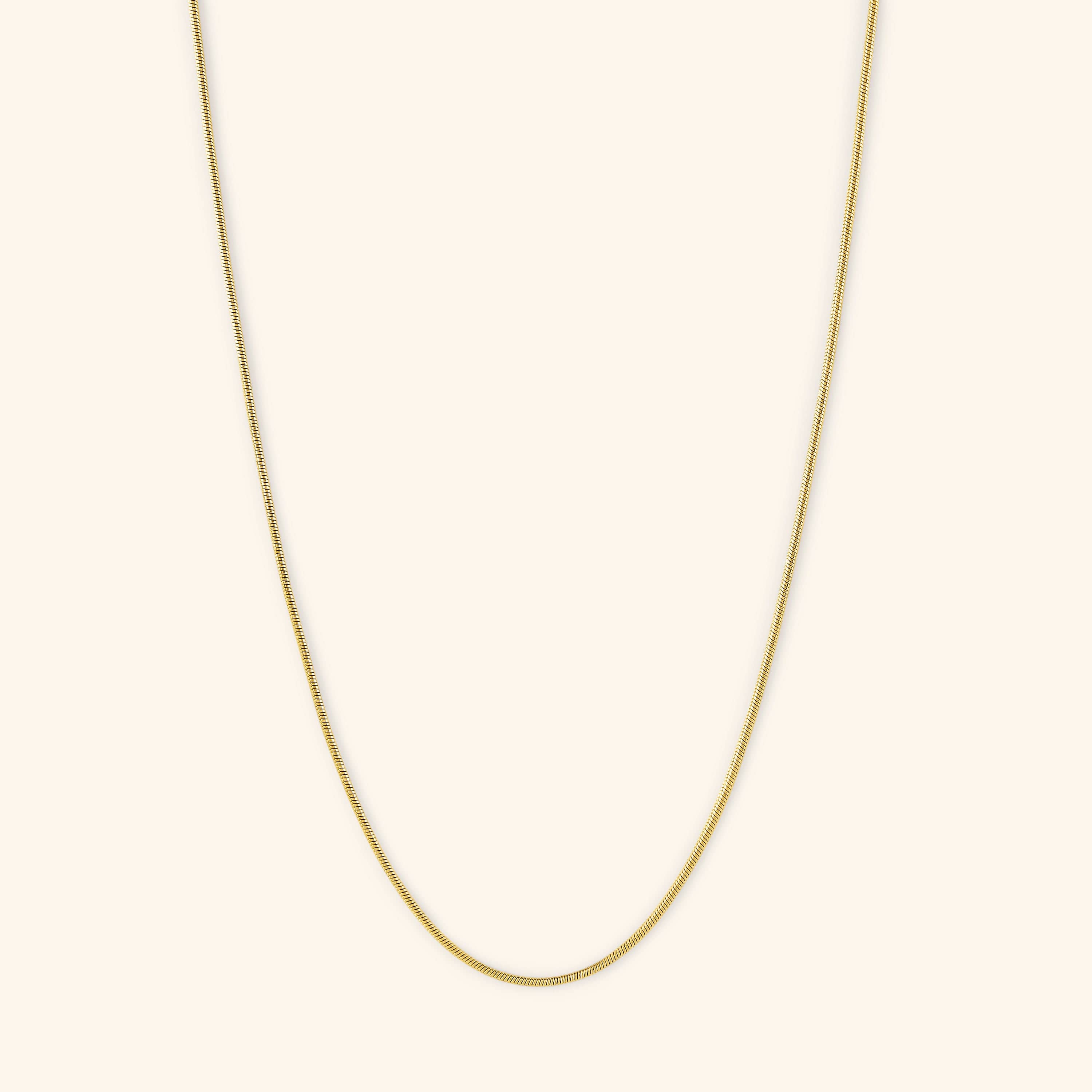 Close-up of the Invisible Elegance Gold Chain showcasing its seamless design and gold plating, ideal for sensitive skin.
