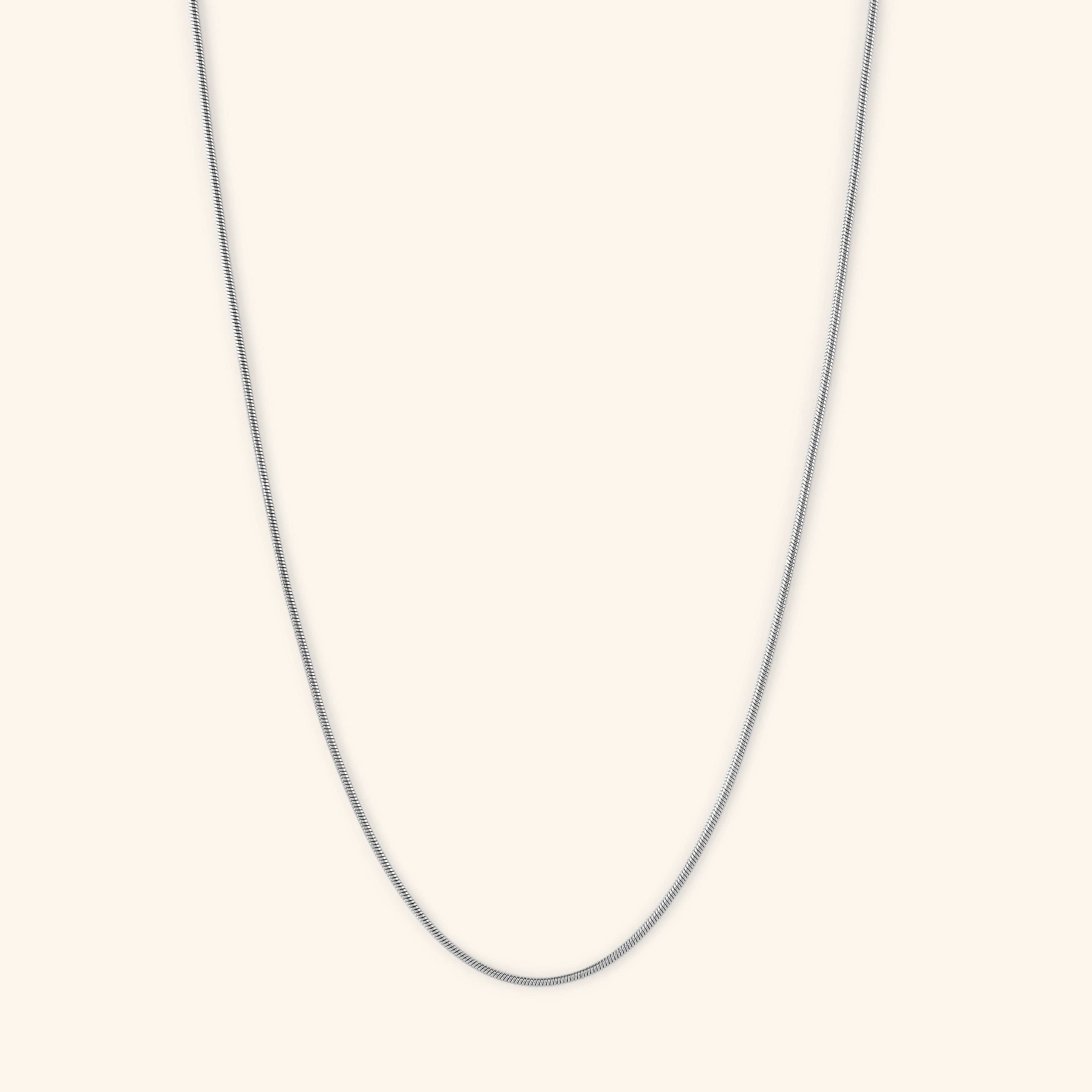 Close-up of the Invisible Elegance Gold Chain showcasing its seamless design and gold plating, ideal for sensitive skin.