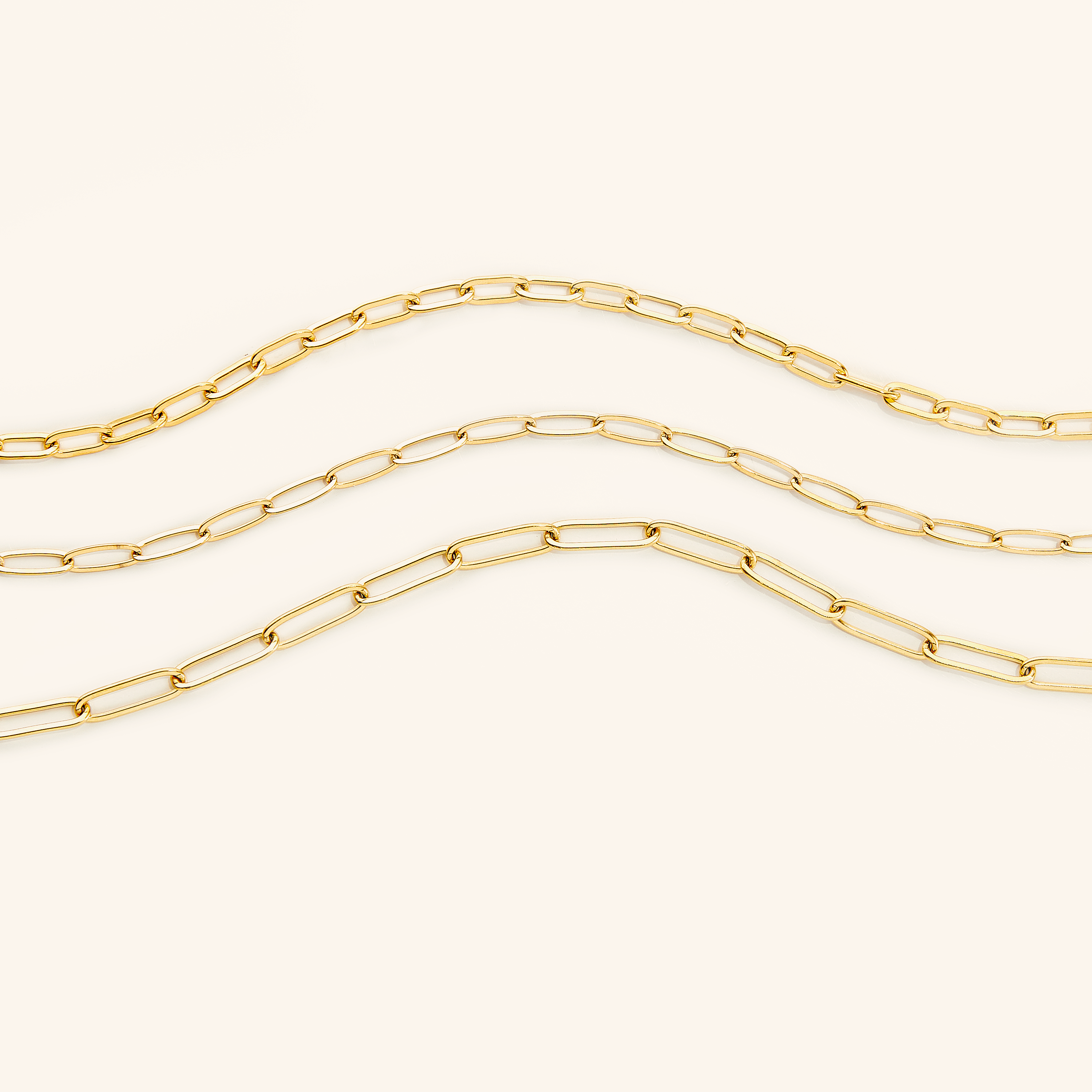 Elegant gold chain anklet displayed on a models ankle, highlighting its delicate design and fit.