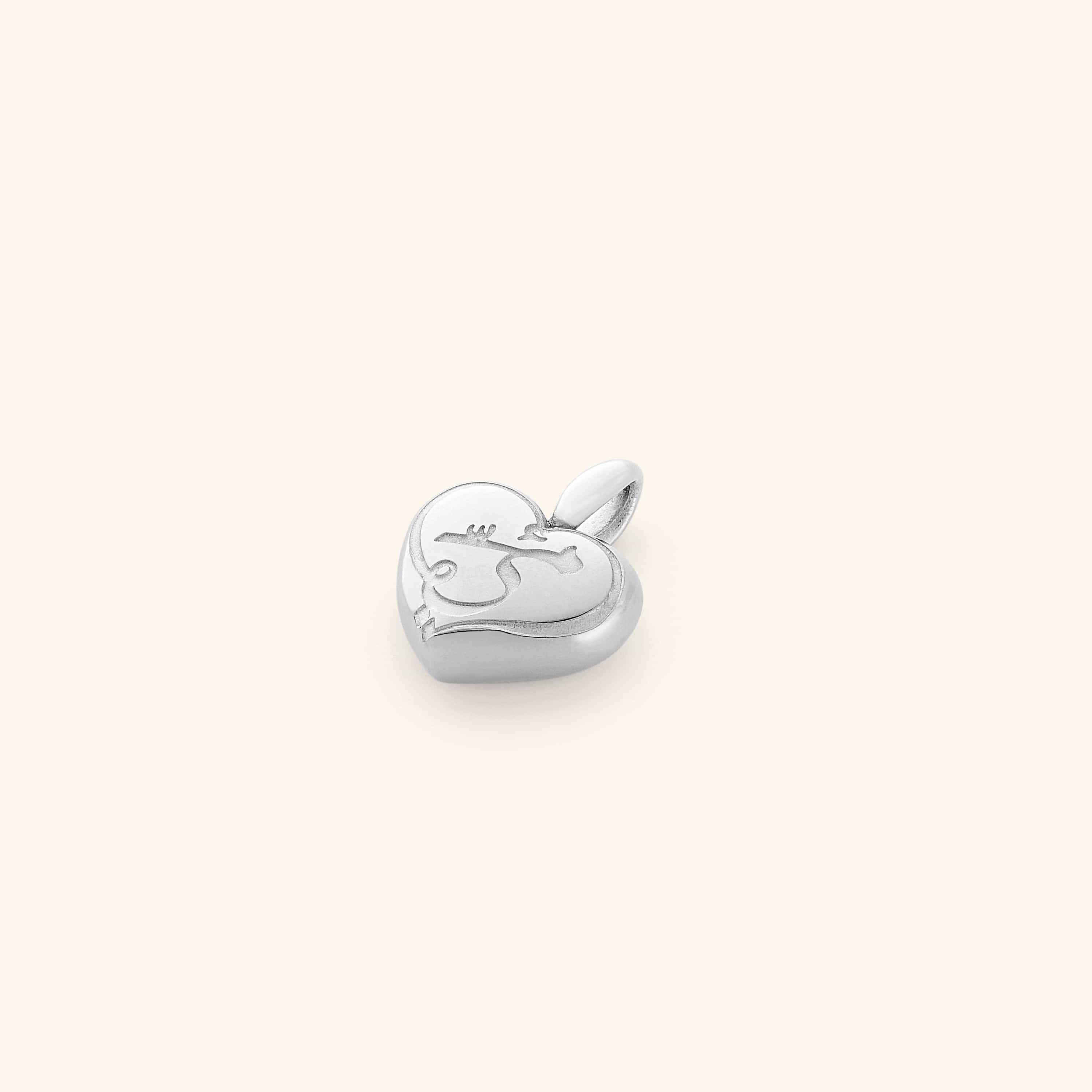 Mamas Heart Charm displayed on a delicate chain, highlighting its elegance and versatility.