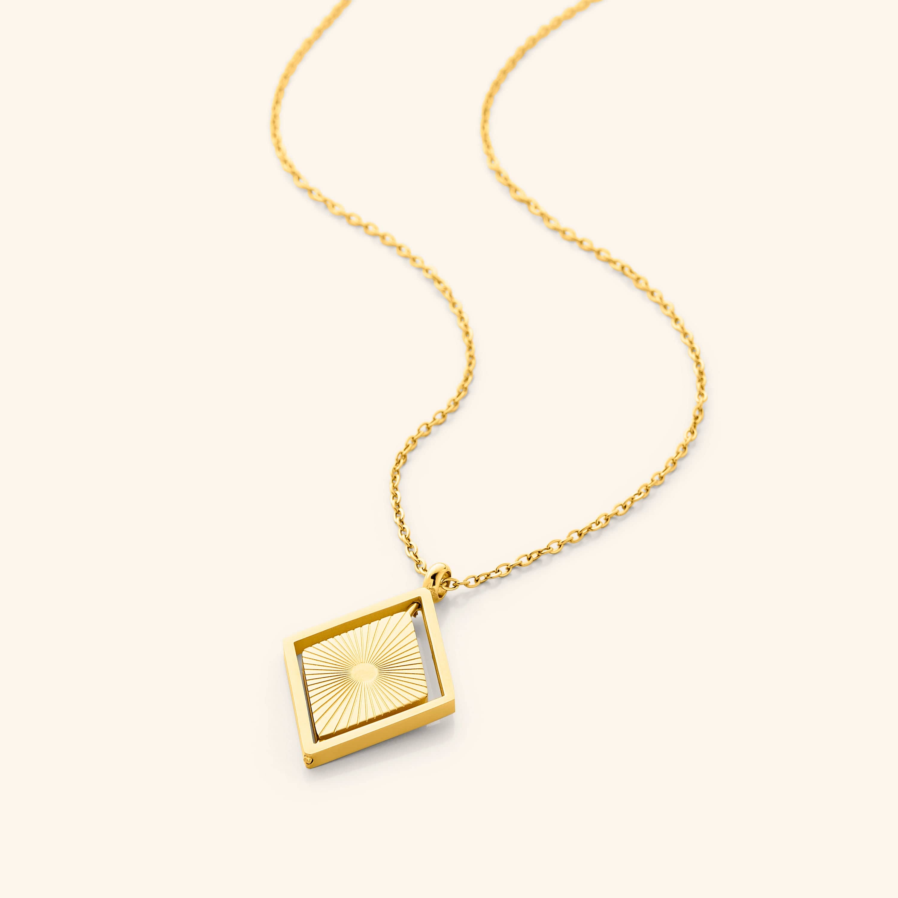 Close-up of the spinning diamond pendant on the Radiant Sun Necklace