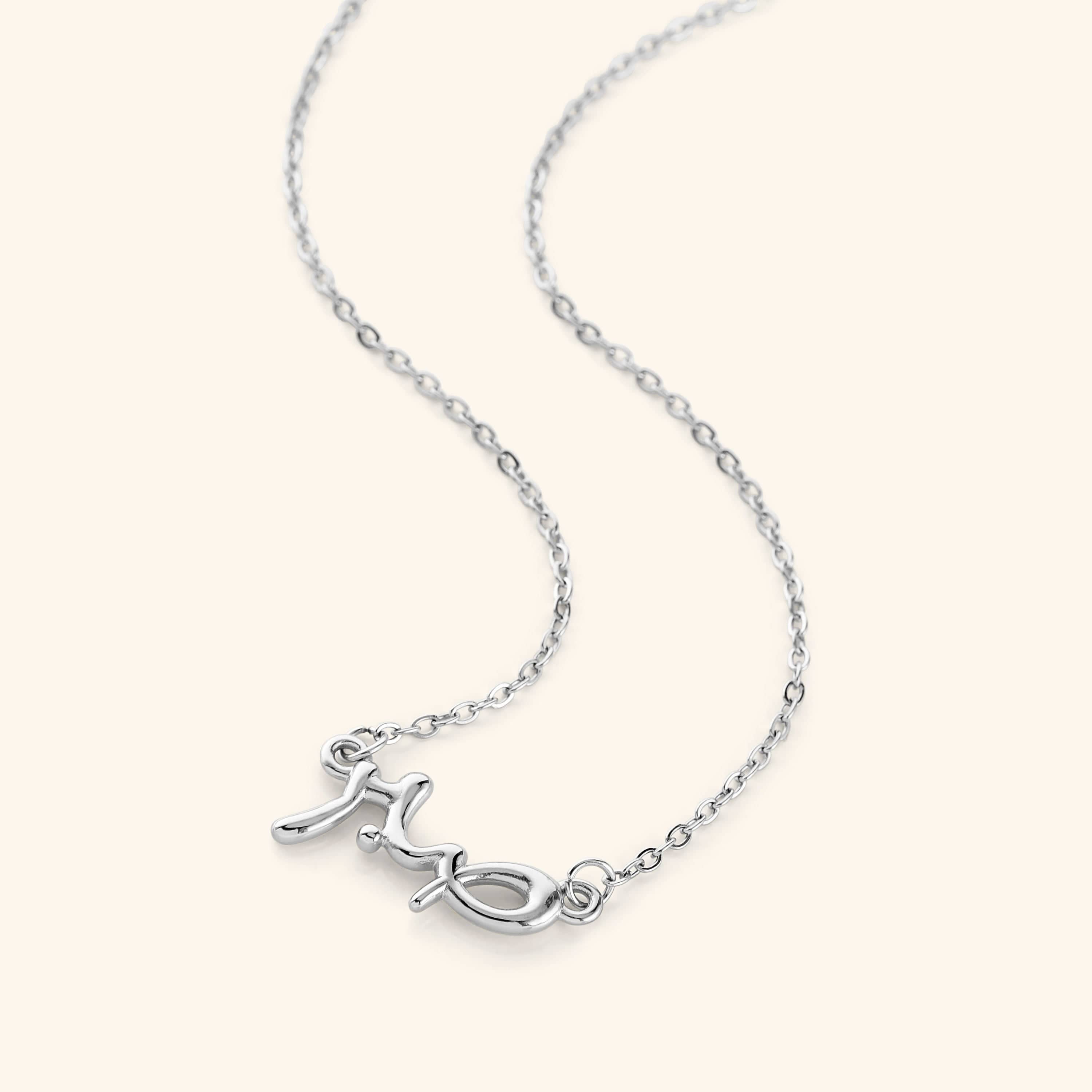 Model wearing the waterproof gold necklace in a casual setting.