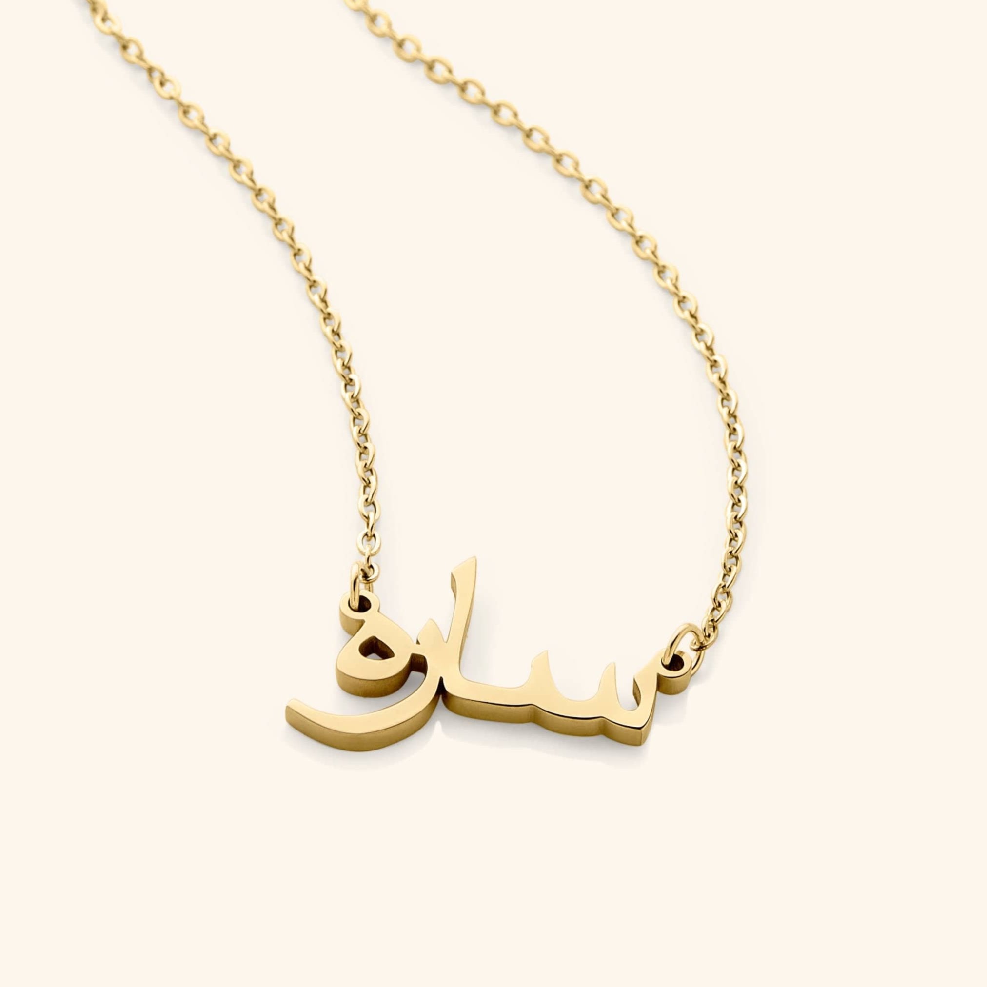 Custom name necklace displayed on a model, highlighting the elegant design.