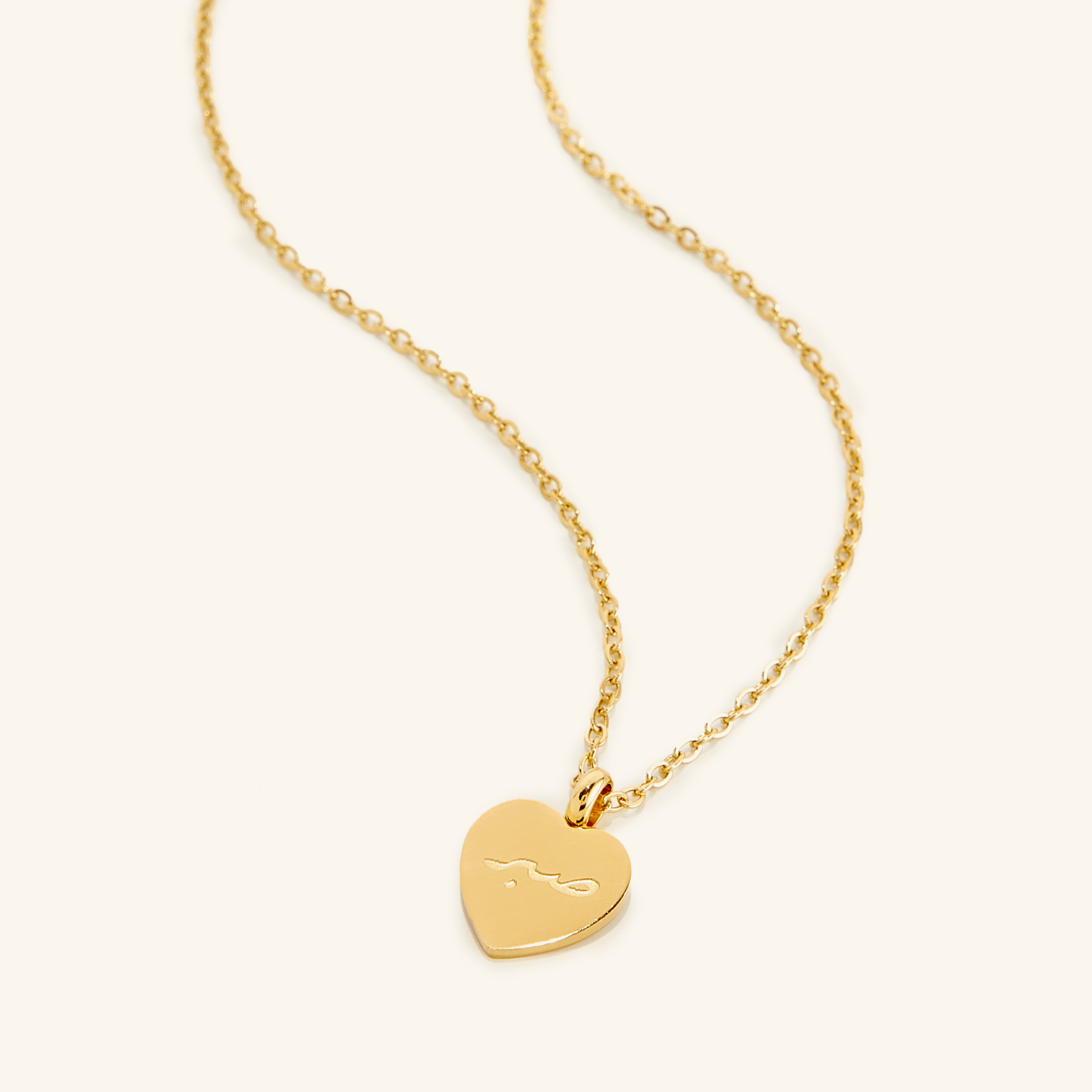 Close-up of the Patience Charm Necklace showcasing its intricate pendant design.