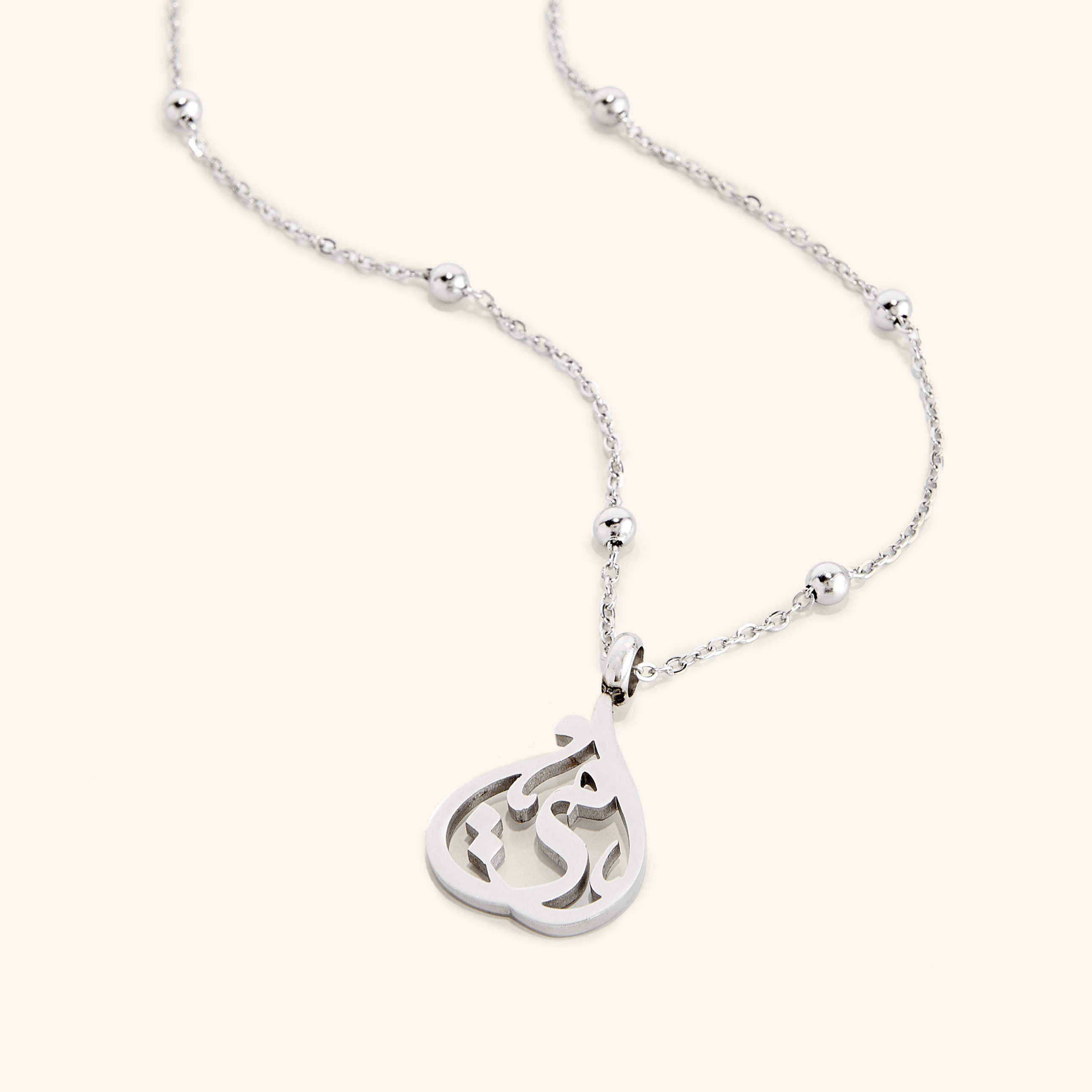 Ummi necklace displayed in a velvet pouch, highlighting its elegance and perfect gift presentation.