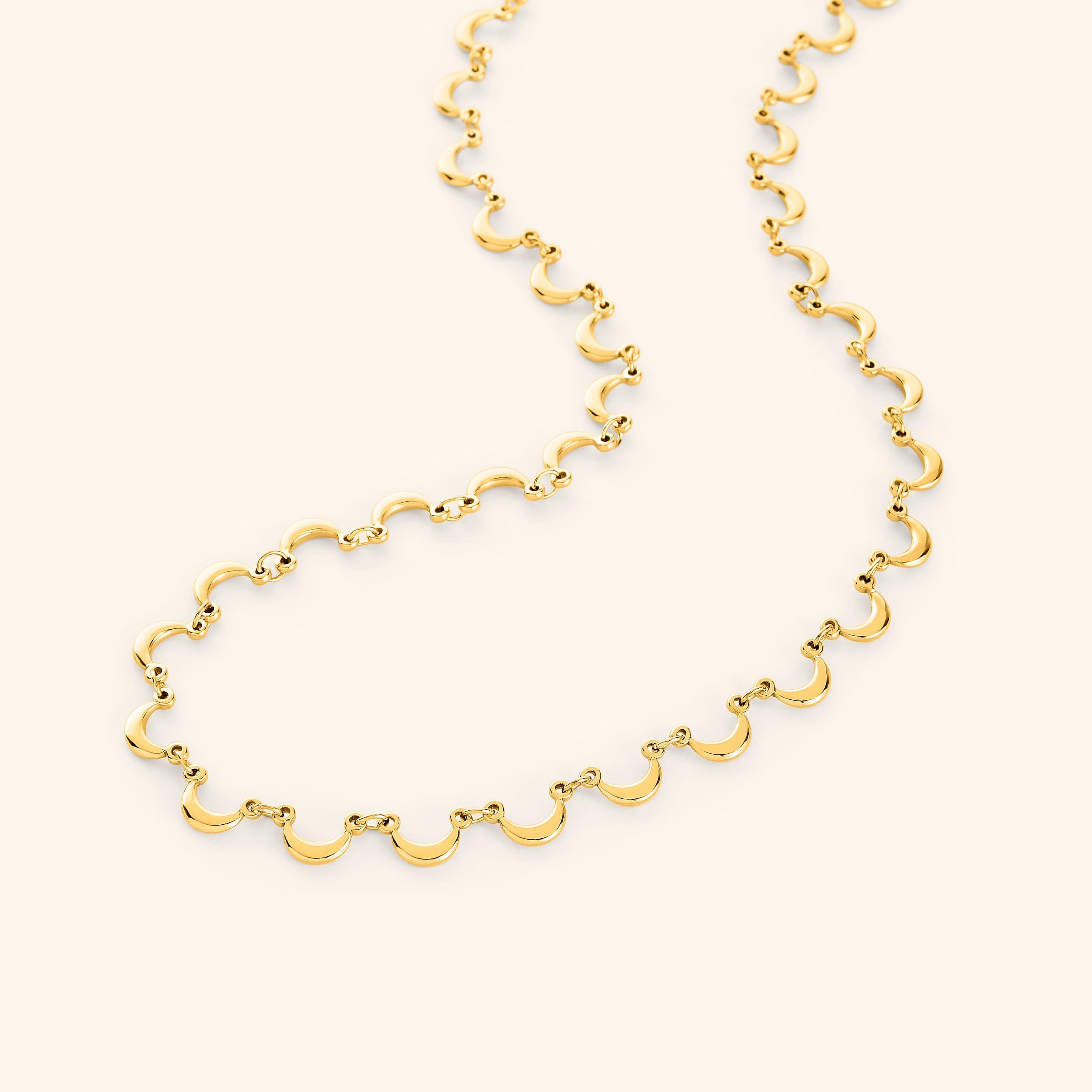 Celestial Elegance Necklace on a model, showcasing its layered look.