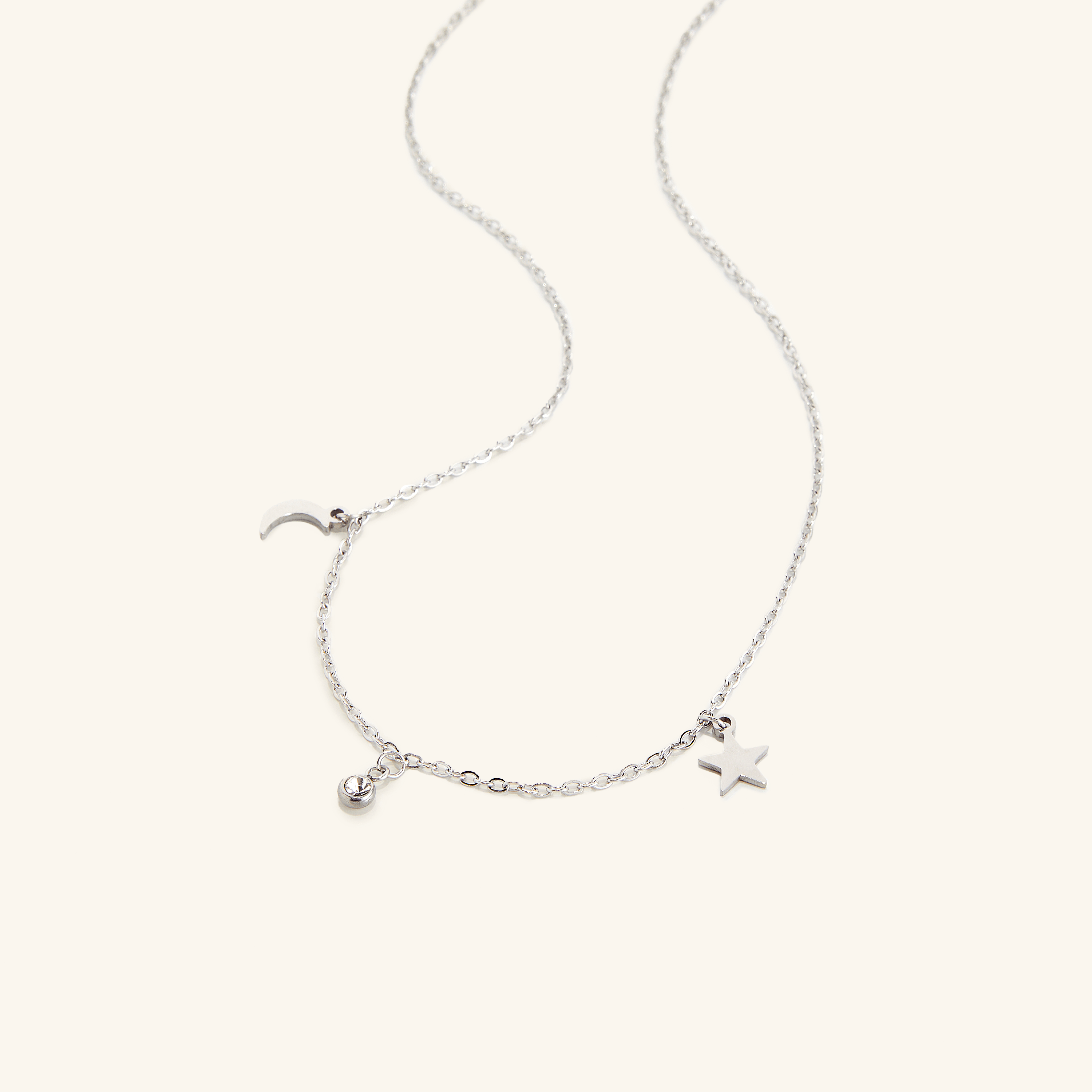 Elegant presentation of the gold necklace in a velvet pouch, emphasizing its luxurious appeal.