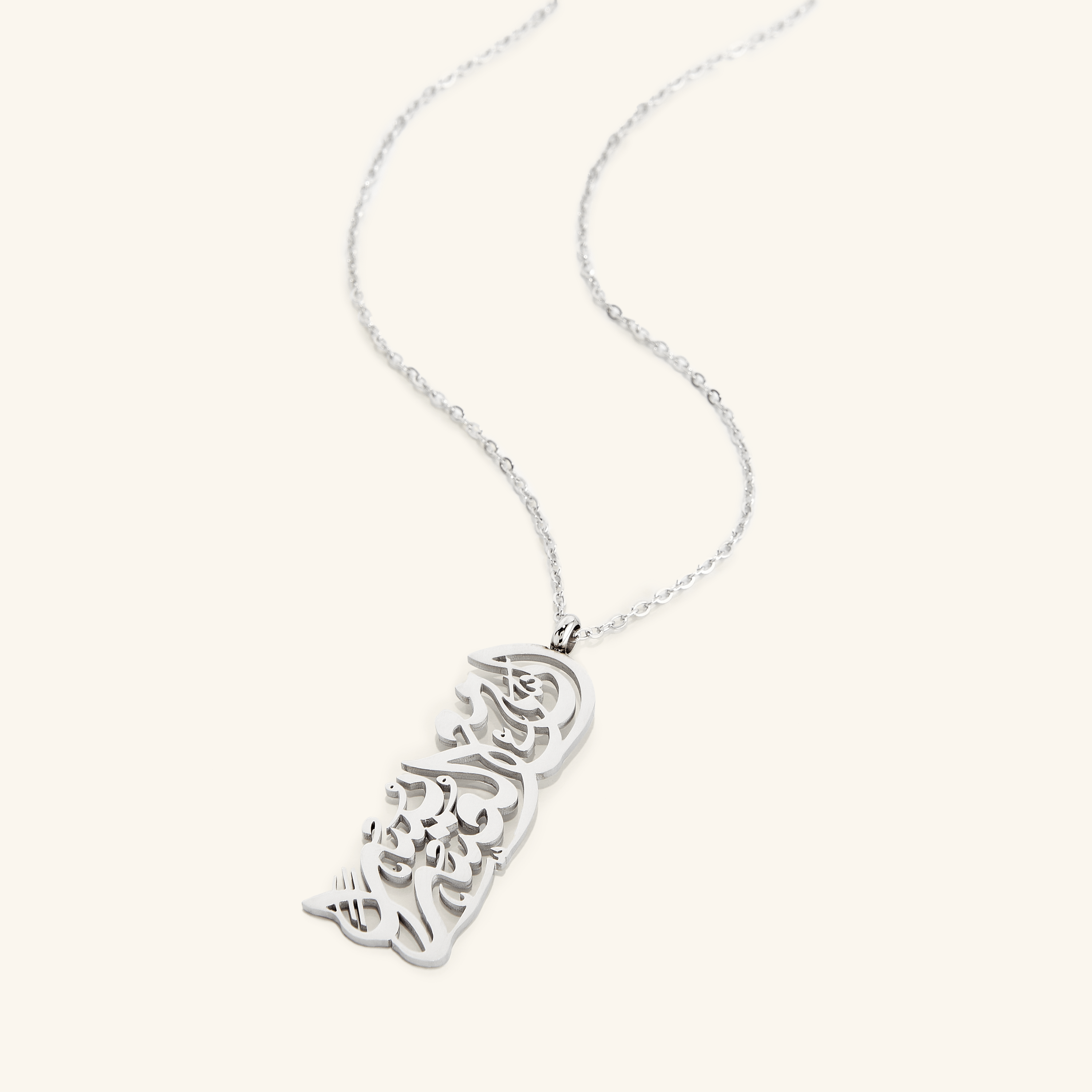 Model wearing the motivational jewelry, demonstrating its versatility and elegance in casual wear.